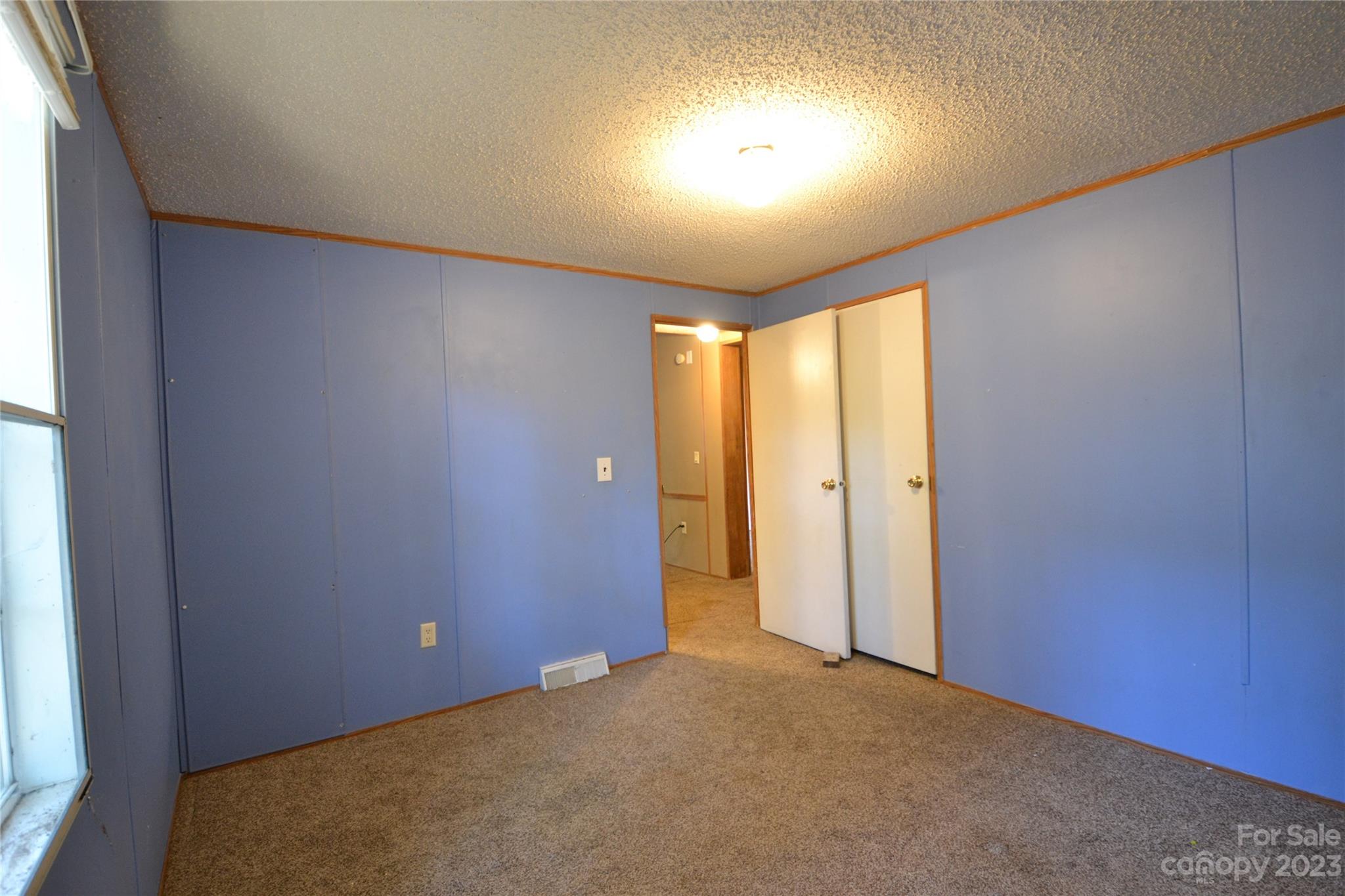 555 Kepley Road Salisbury, NC 28147 - Photo 29 of 39 an empty room with windows and closet
