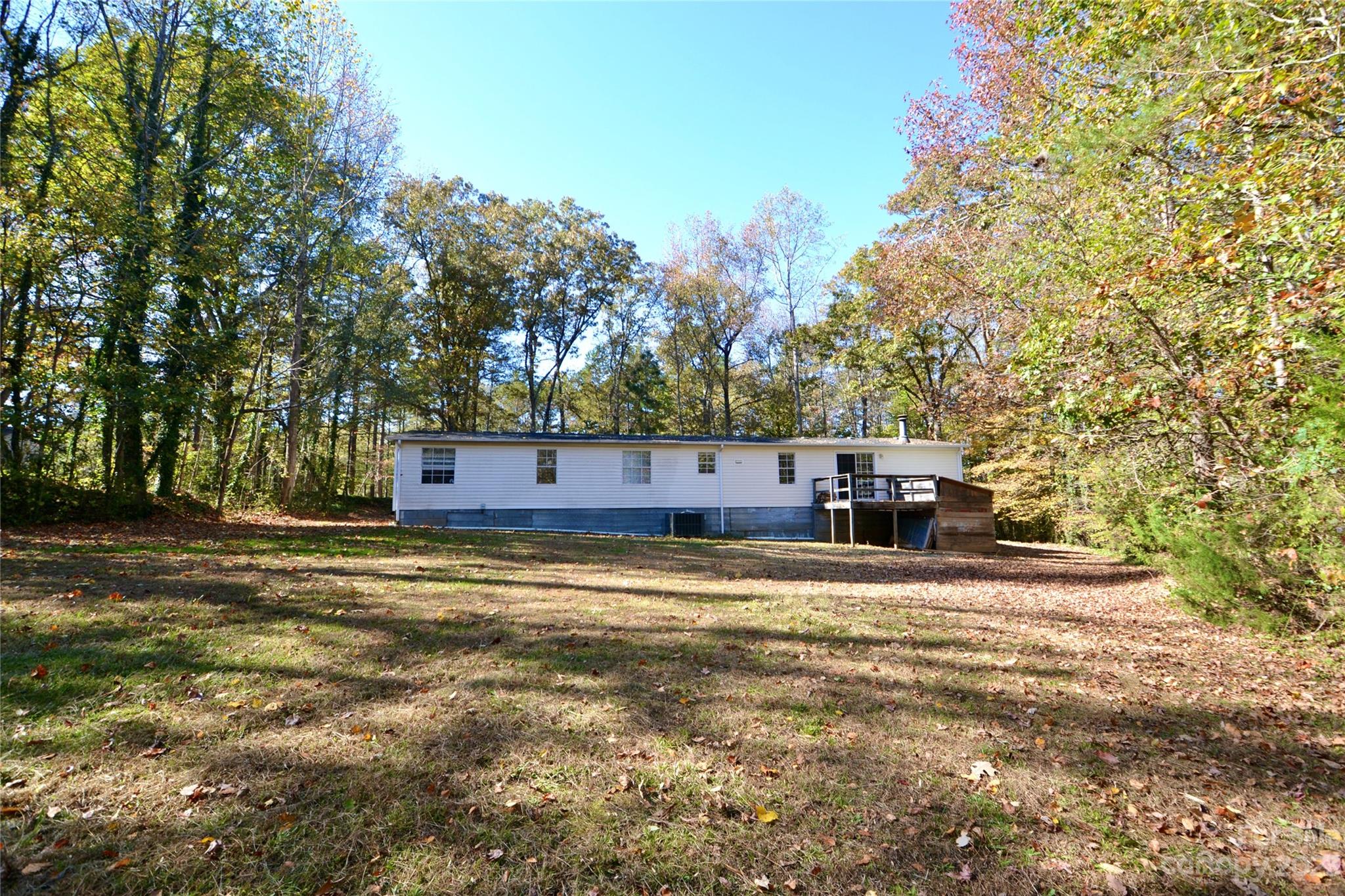 555 Kepley Road Salisbury, NC 28147 - Photo 3 of 39 a house with a large tree in front of it