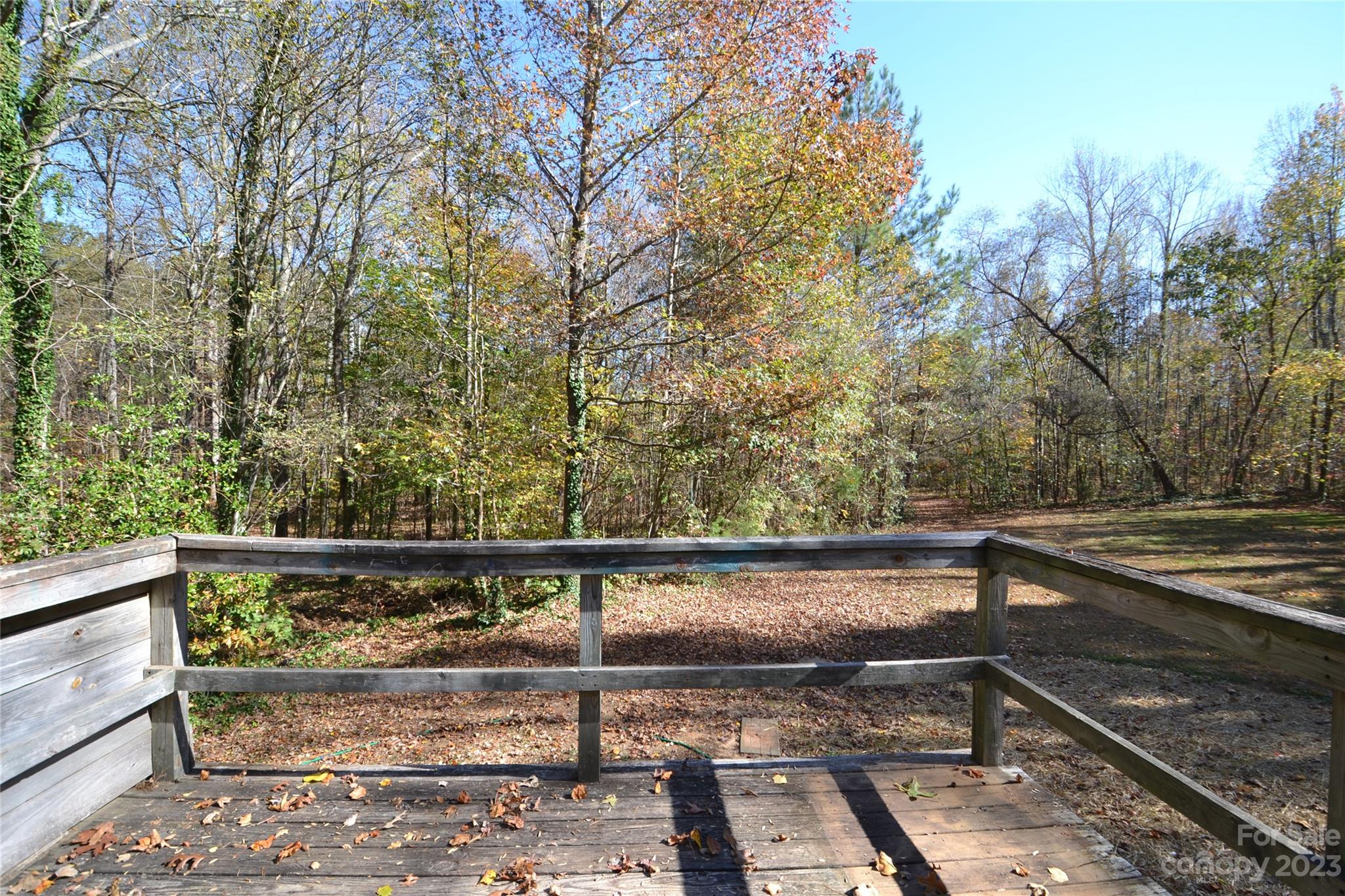 555 Kepley Road Salisbury, NC 28147 - Photo 4 of 39 a view of outdoor space with wooden deck and trees