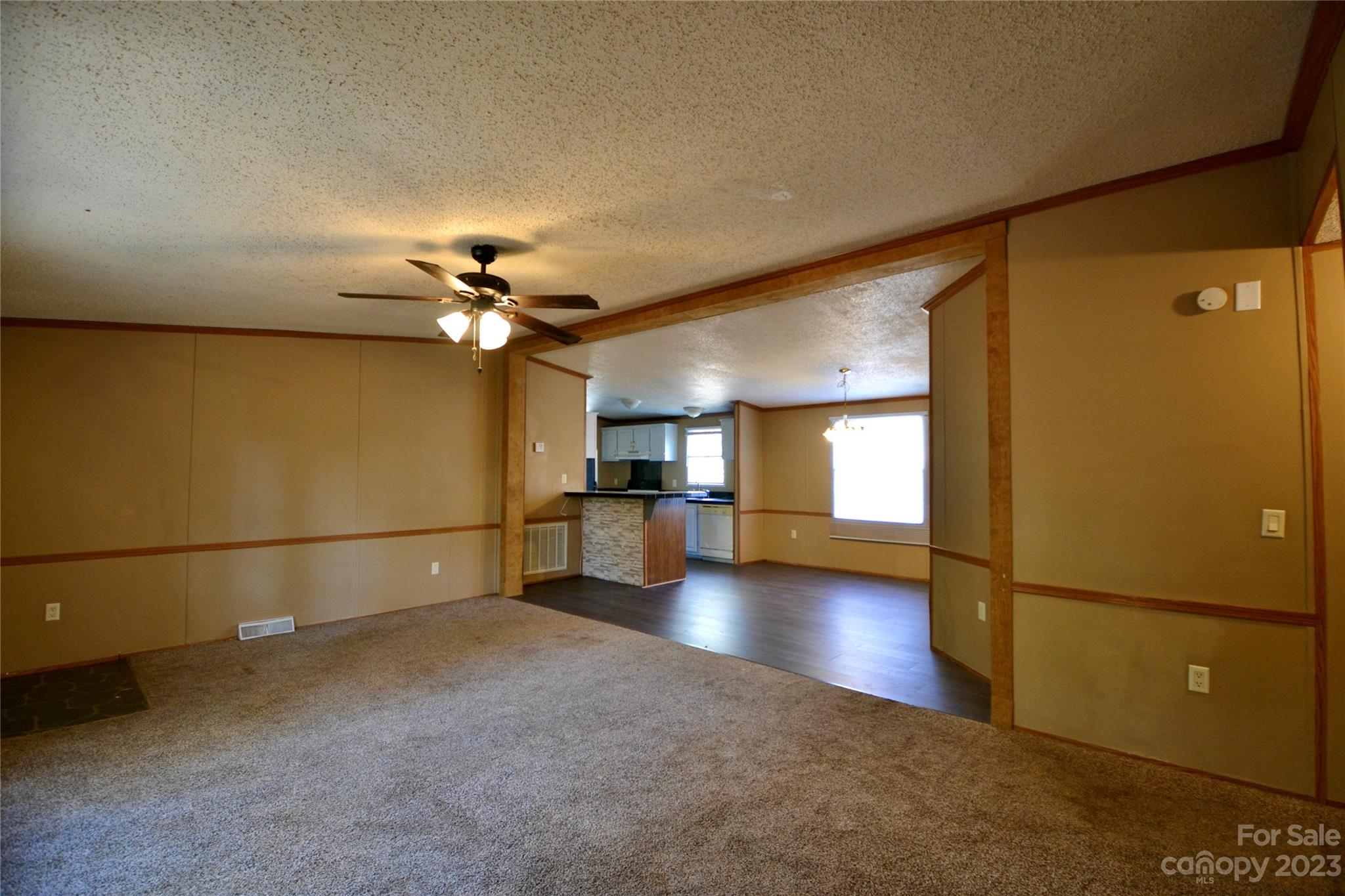 555 Kepley Road Salisbury, NC 28147 - Photo 7 of 39 a view of a livingroom with a ceiling fan and window