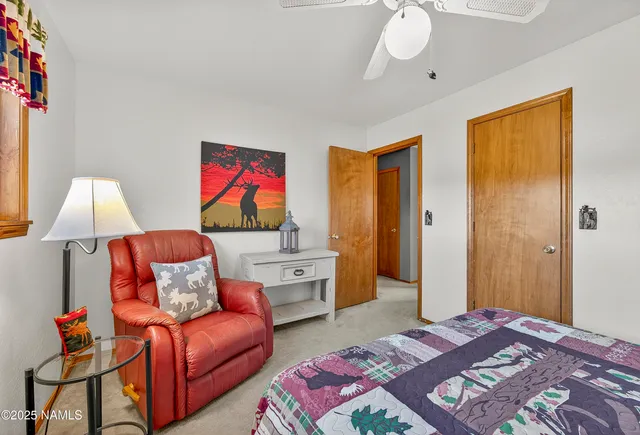 a view of a swimming pool with an outdoor space and seating