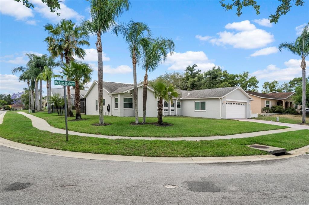 10932 Midland Bridge Road Hudson, FL 34667 - Photo 1 of 1 Front Corner View