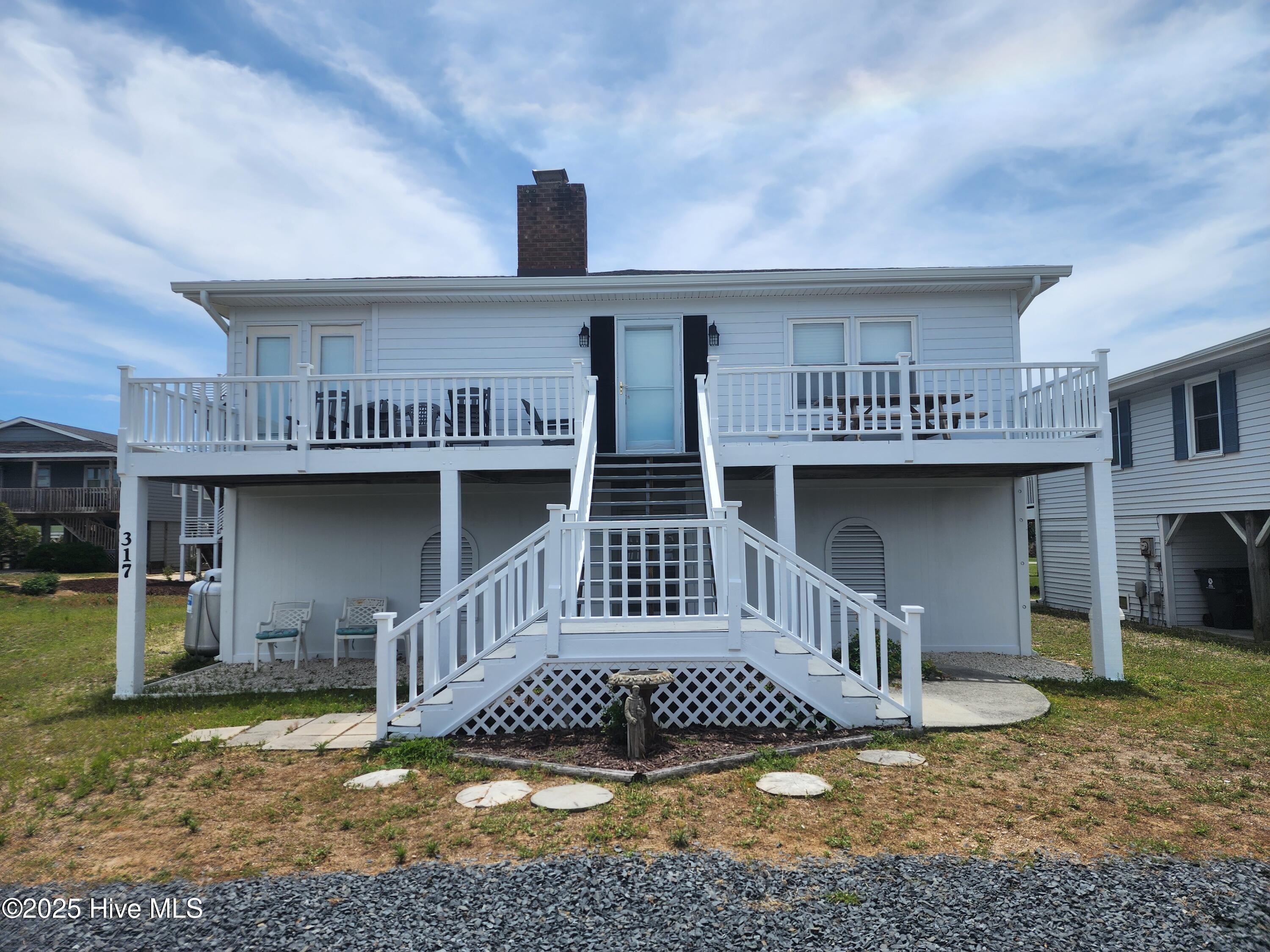 317 Sand Piper Lane Holden Beach, NC 28462 - Photo 16 of 26 View from the street