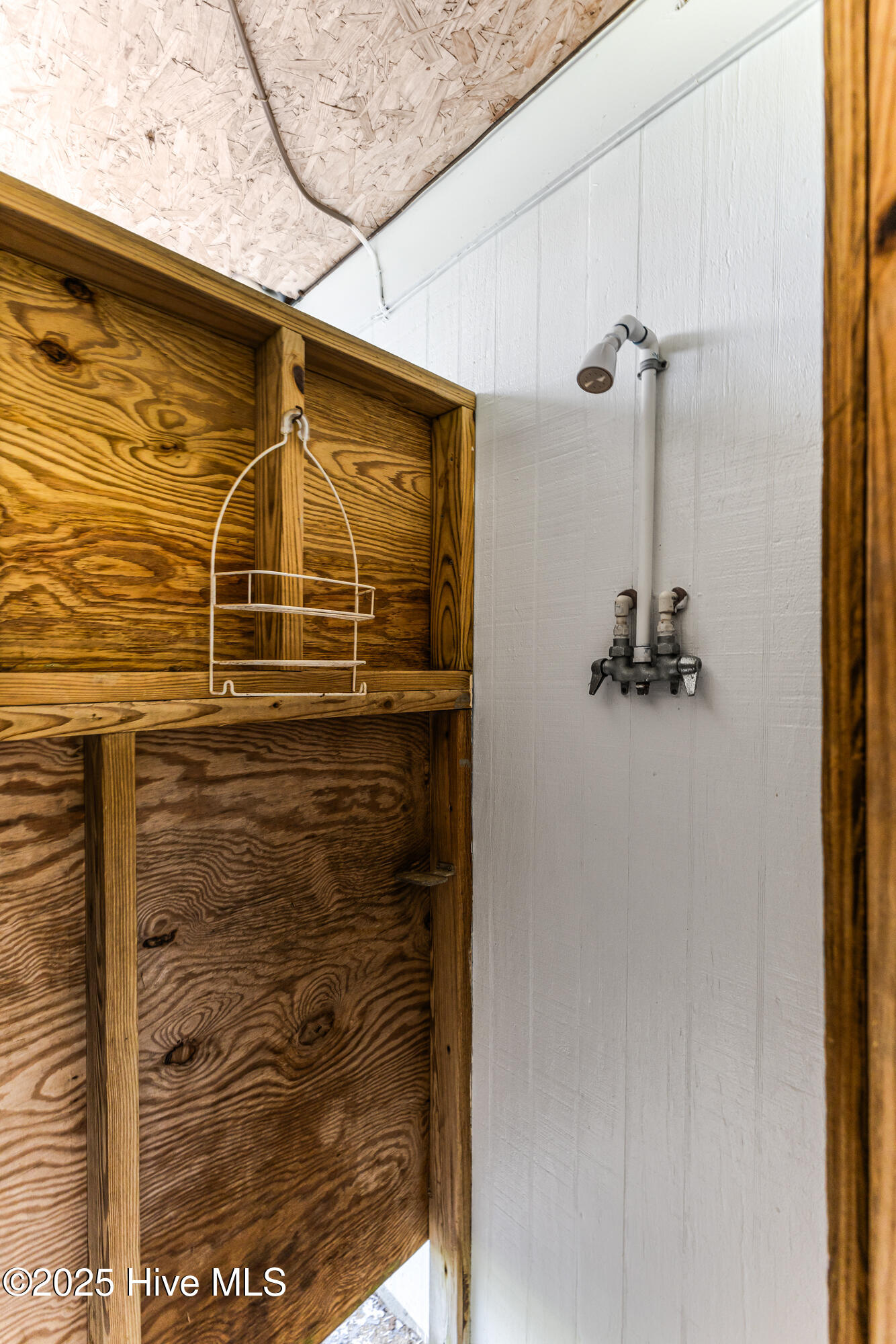 317 Sand Piper Lane Holden Beach, NC 28462 - Photo 21 of 26 outdoor shower