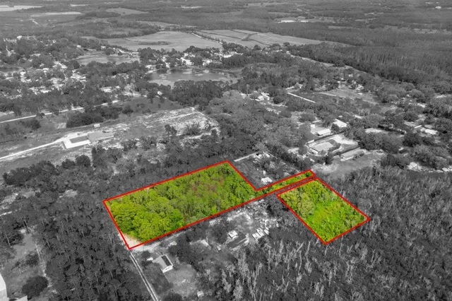 a view of a back yard of a house