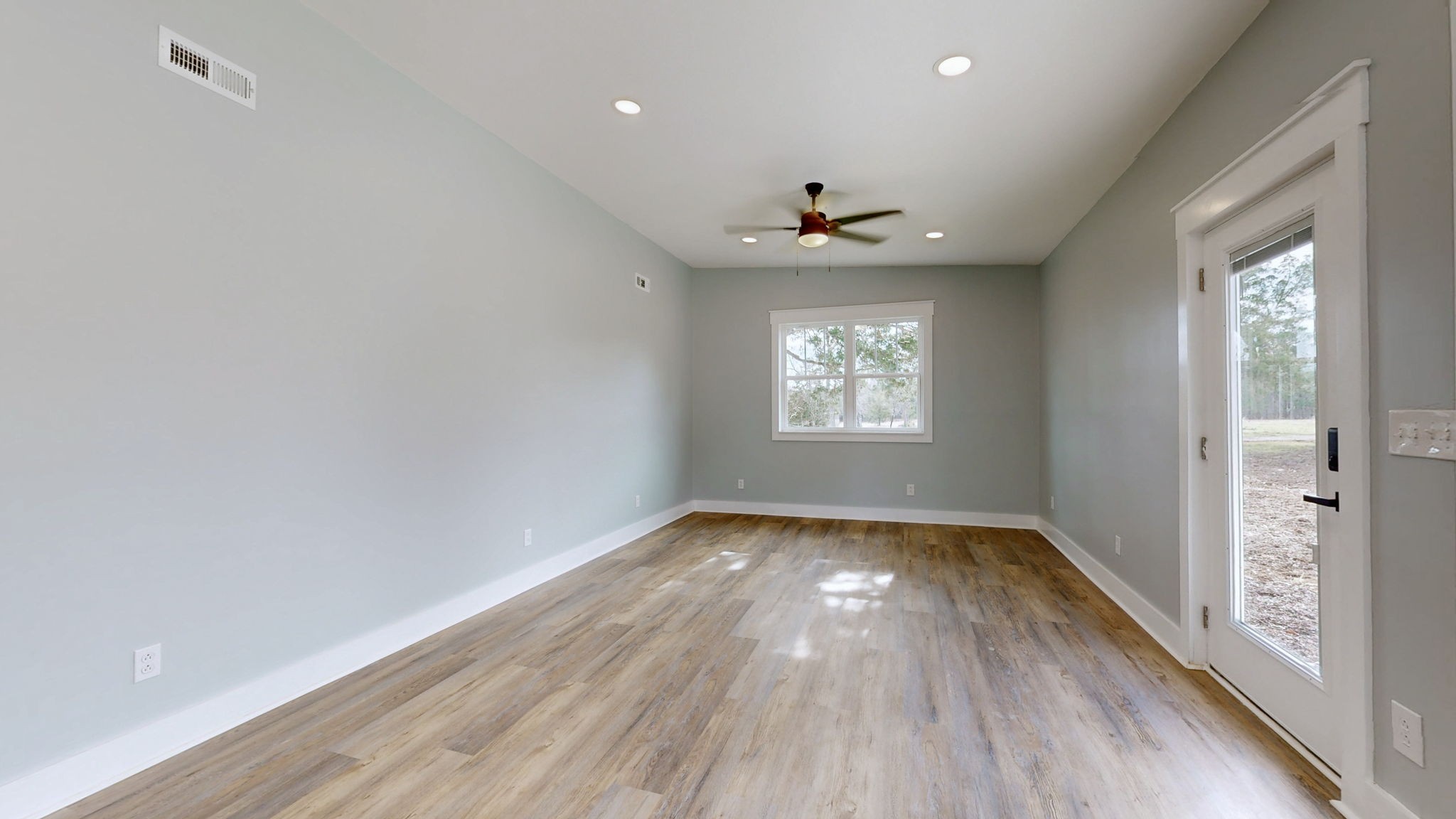 94 Bond Road Lebanon, TN 37090 - Photo 16 of 32 wooden floor in an empty room with a window