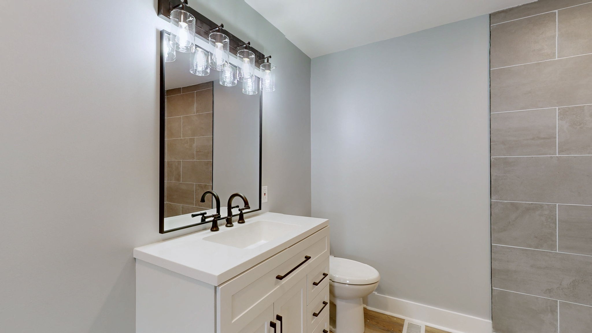 94 Bond Road Lebanon, TN 37090 - Photo 19 of 32 a bathroom with a sink and a mirror
