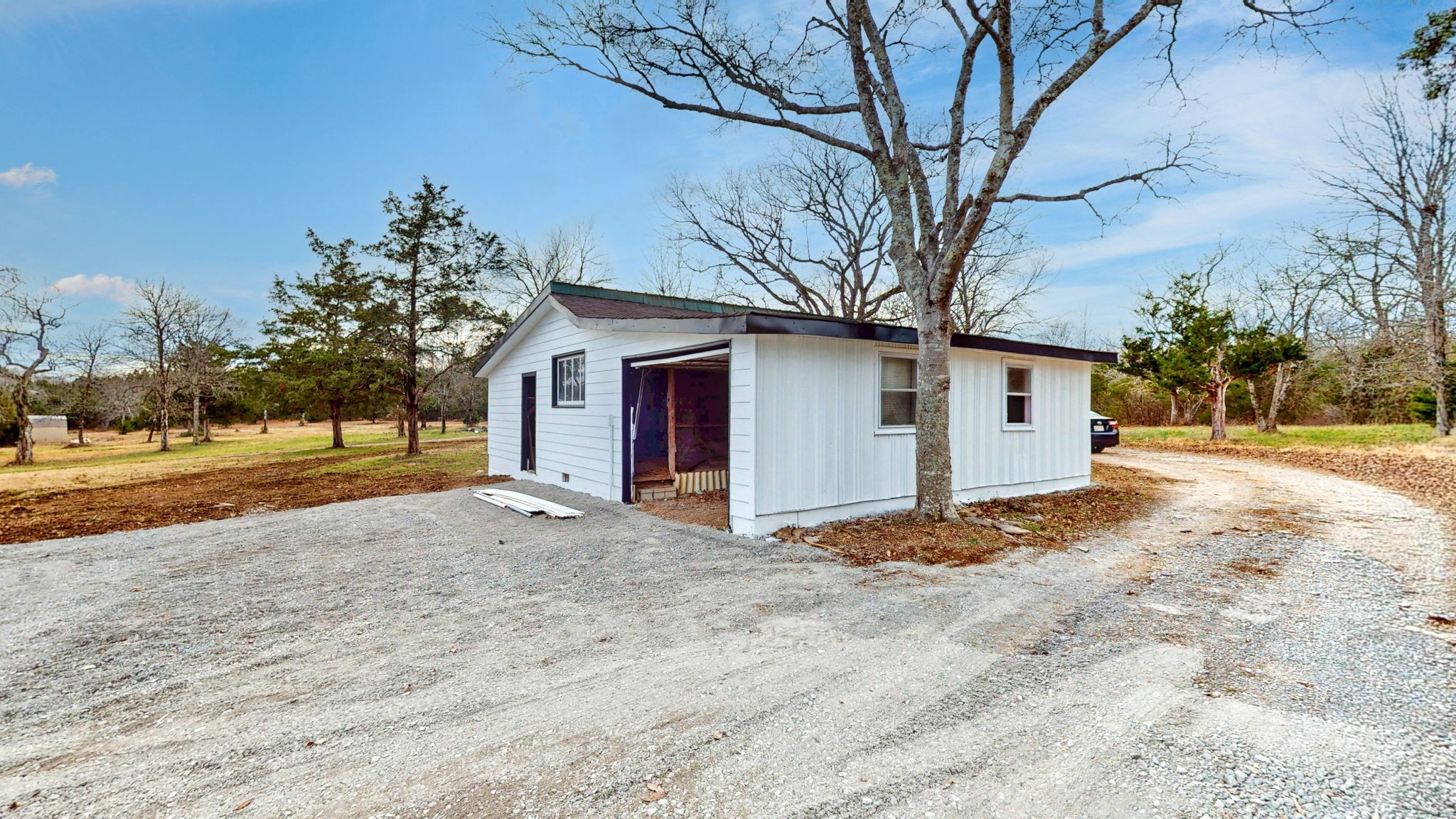 94 Bond Road Lebanon, TN 37090 - Photo 28 of 32 a view of a house with a snow in the yard