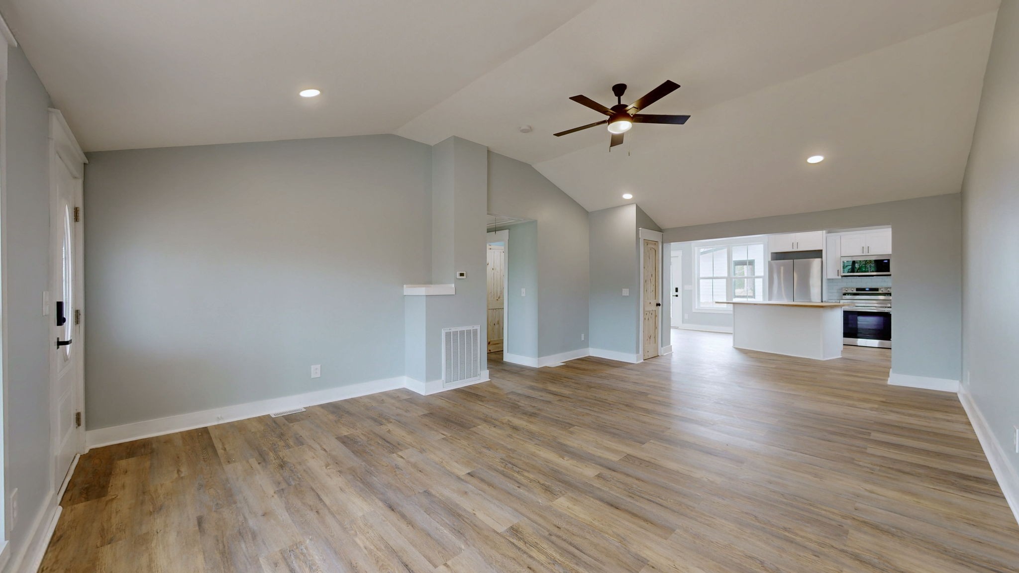 94 Bond Road Lebanon, TN 37090 - Photo 8 of 32 a view of empty room with wooden floor and ceiling fan