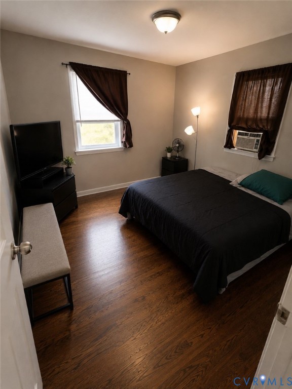 6316 Derwent Road Richmond, VA 23225 - Photo 8 of 10 Room featuring wood-finish flooring, two windows w