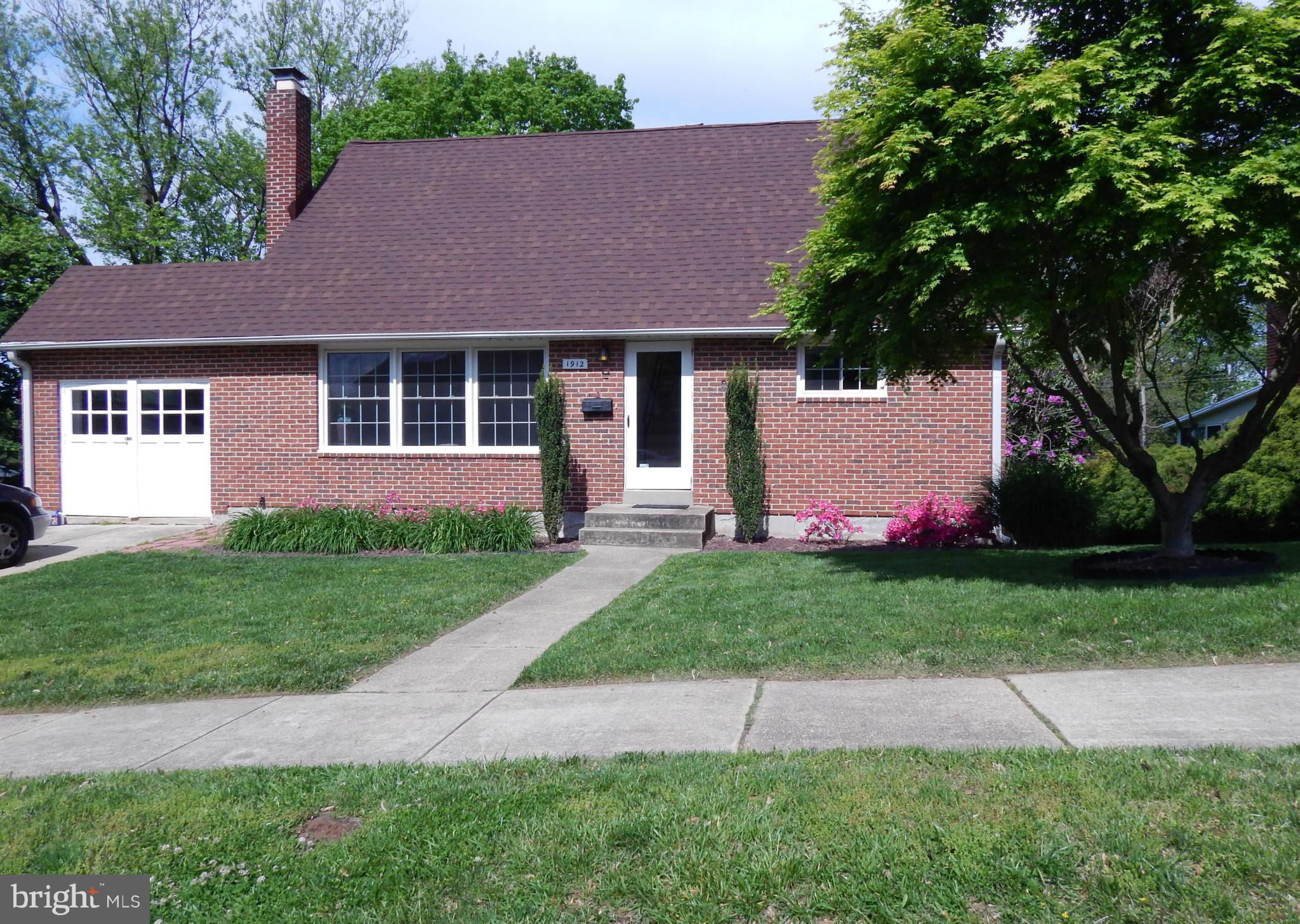 1912 Tadcaster Road Catonsville, MD 21228 - Photo 1 of 26 a view of a house with a yard