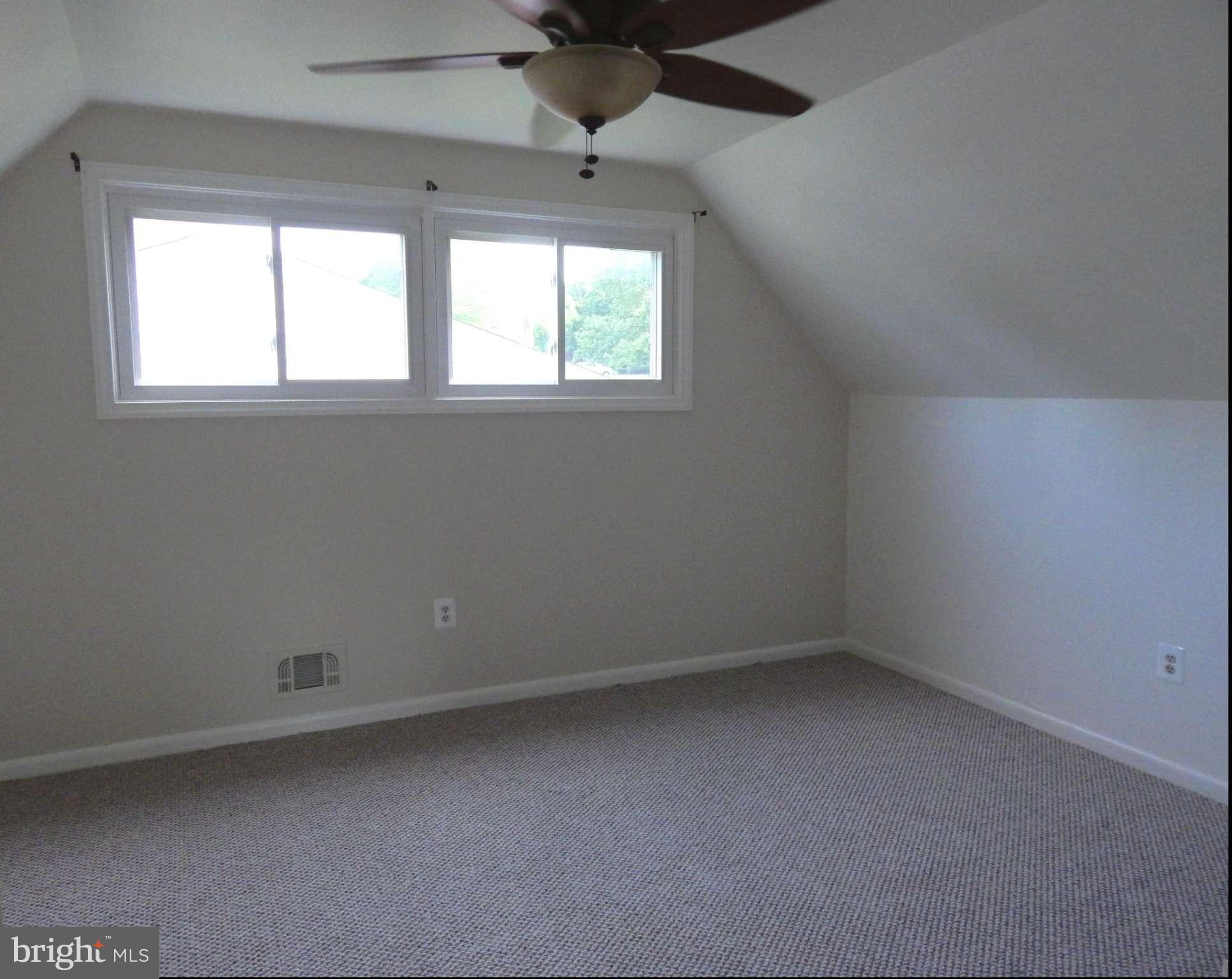 1912 Tadcaster Road Catonsville, MD 21228 - Photo 22 of 26 an empty room with a window
