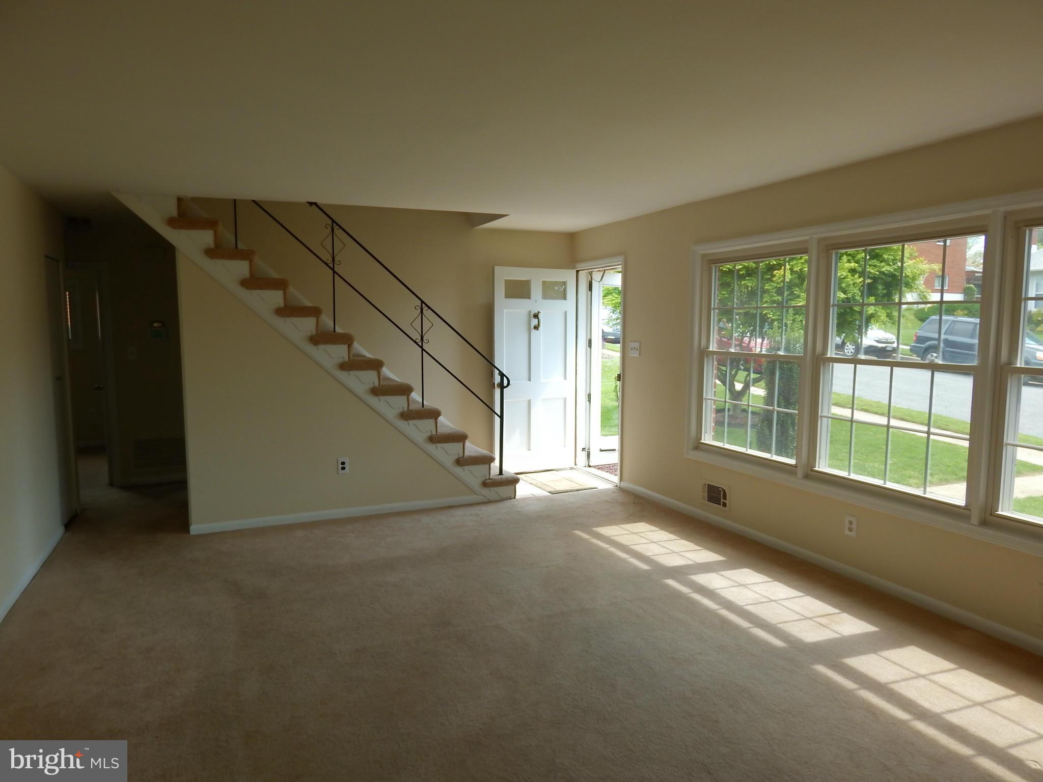 1912 Tadcaster Road Catonsville, MD 21228 - Photo 5 of 26 a view of an empty room with a window