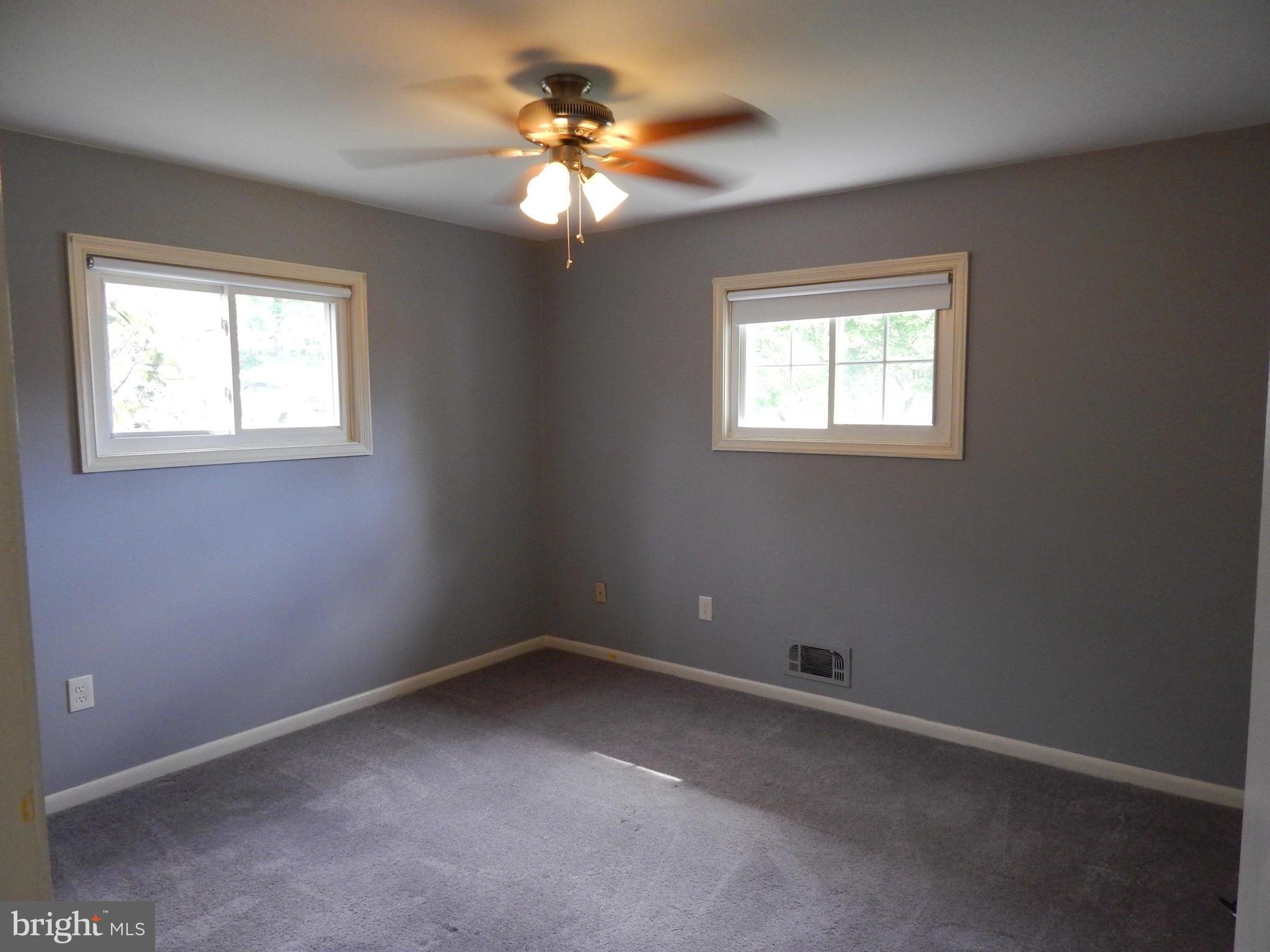 1912 Tadcaster Road Catonsville, MD 21228 - Photo 7 of 26 an empty room with a window