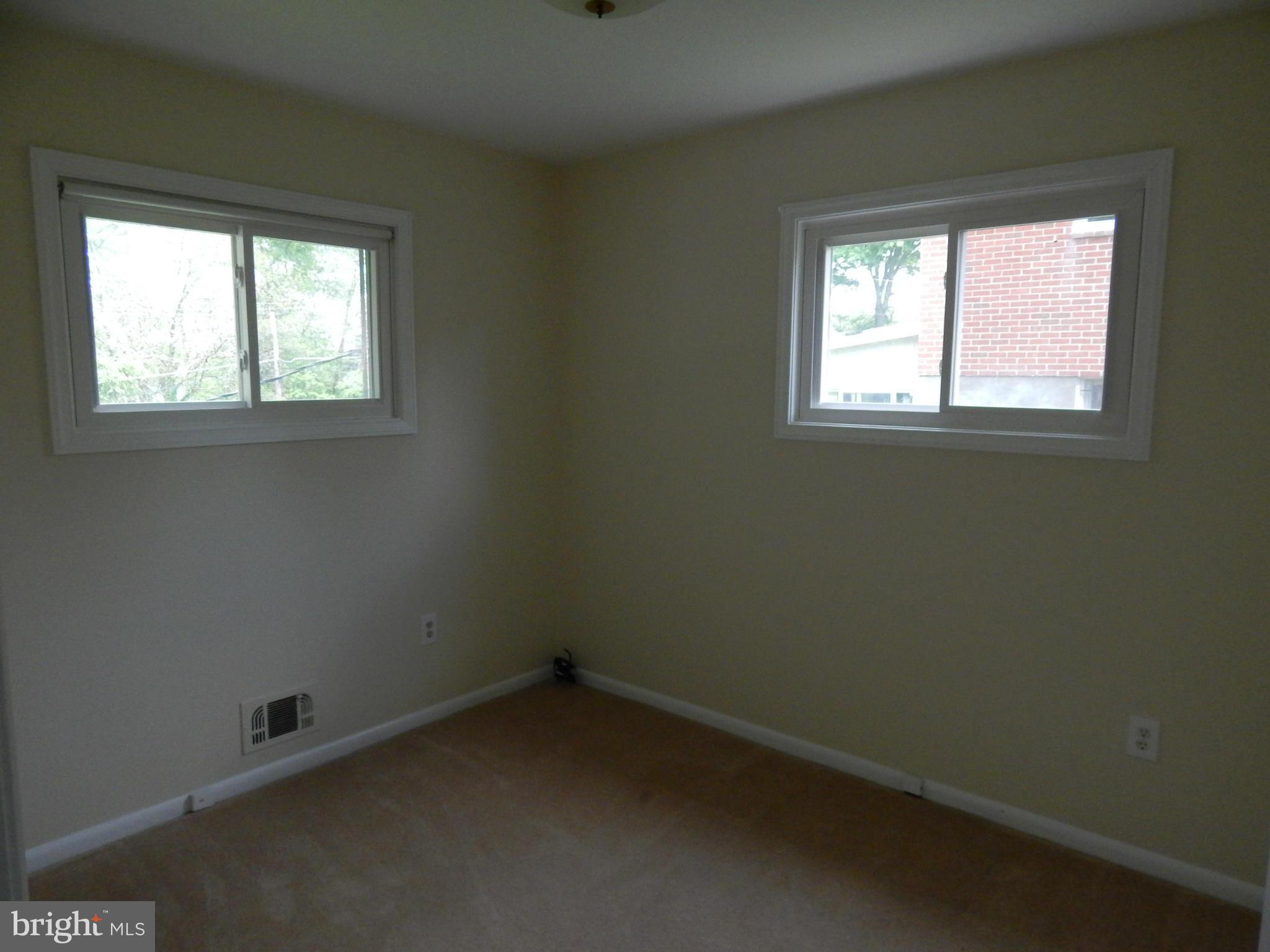1912 Tadcaster Road Catonsville, MD 21228 - Photo 8 of 26 an empty room with a window