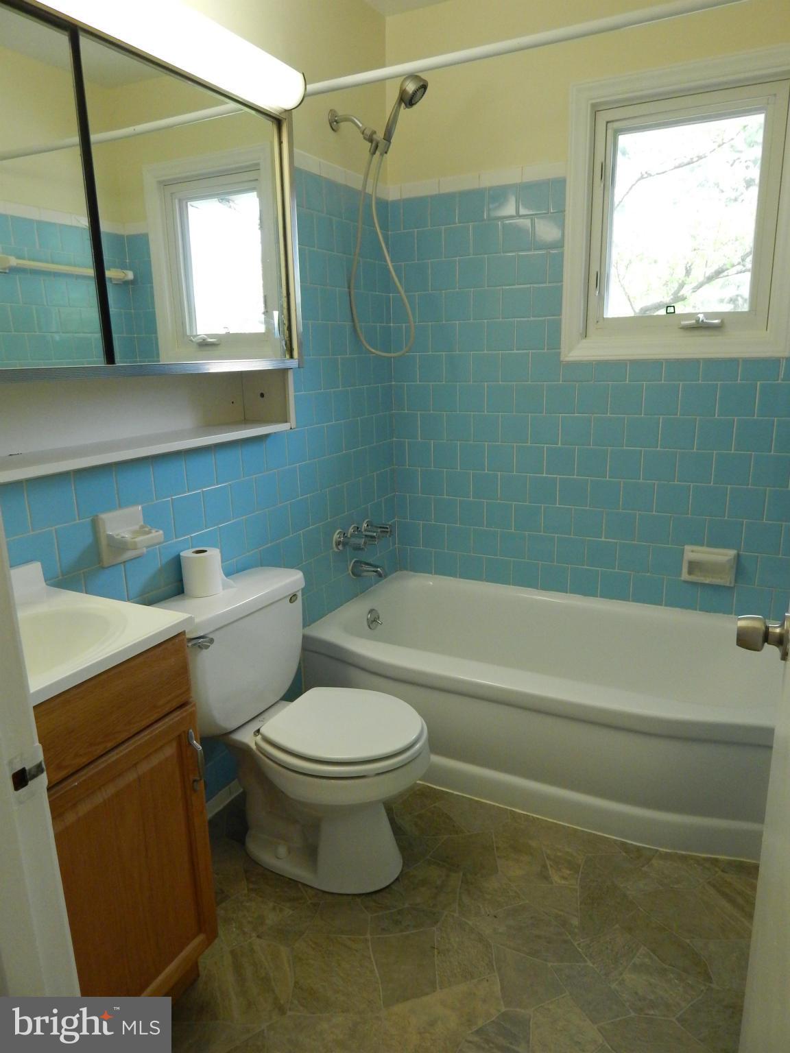 1912 Tadcaster Road Catonsville, MD 21228 - Photo 9 of 26 a bathroom with a toilet and a bathtub