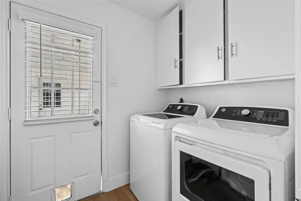 a utility room with dryer and washer