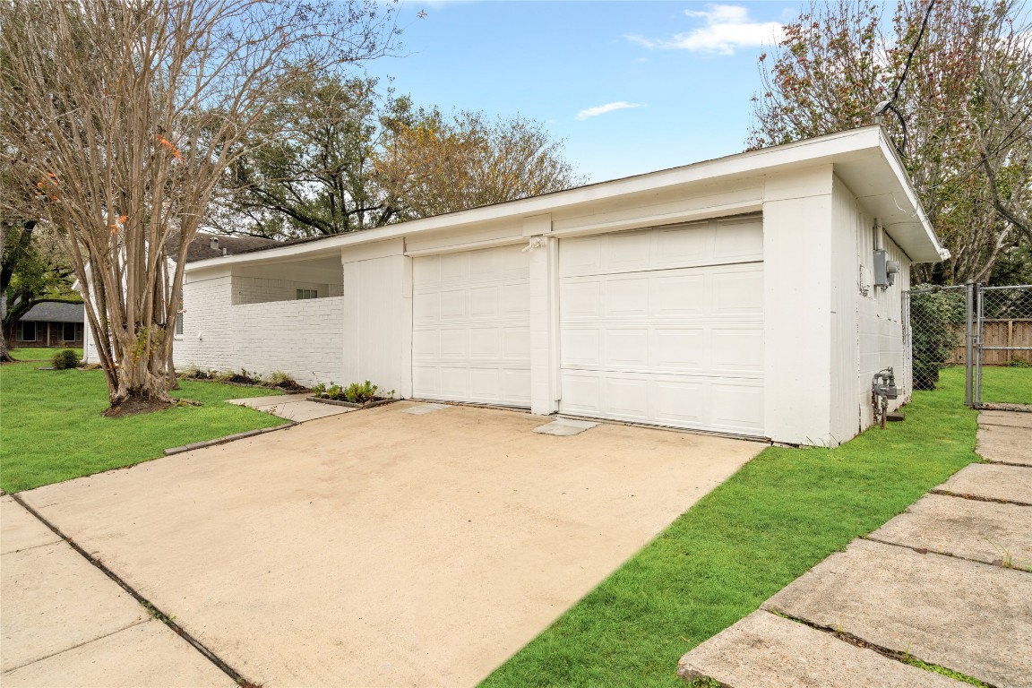 4947 Cheena Drive Houston, TX 77096 - Photo 18 of 18 a view of a backyard with a white house