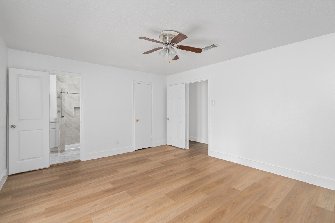 4947 Cheena Drive Houston, TX 77096 - Photo 9 of 18 a view of empty room with wooden floor