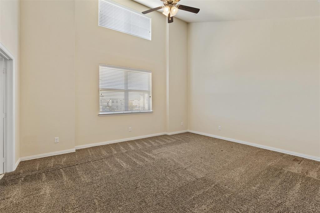 1904 Bethlehem Street Irving, TX 75061 - Photo 19 of 29 an empty room with windows and fan