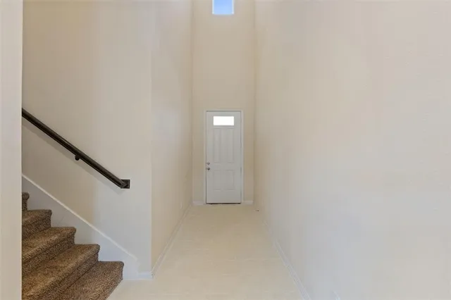 a bathroom with a sink mirror and toilet