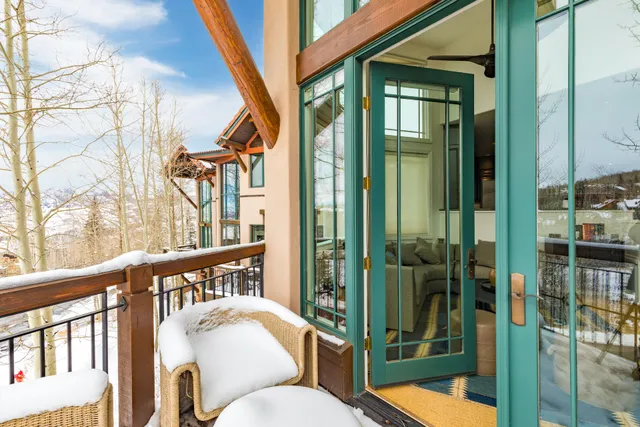 a porch with a glass door