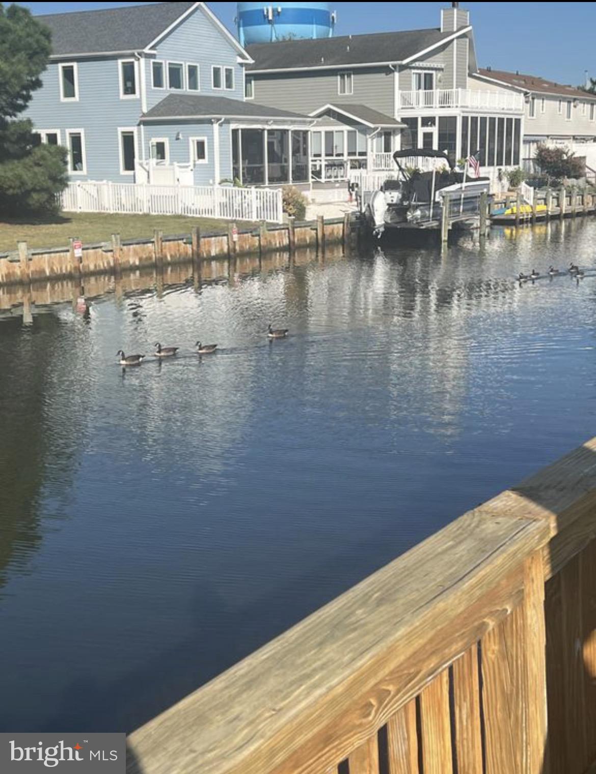 142 Peachtree Road Ocean City, MD 21842 - Photo 5 of 14 a view of residential houses with outdoor space and lake view