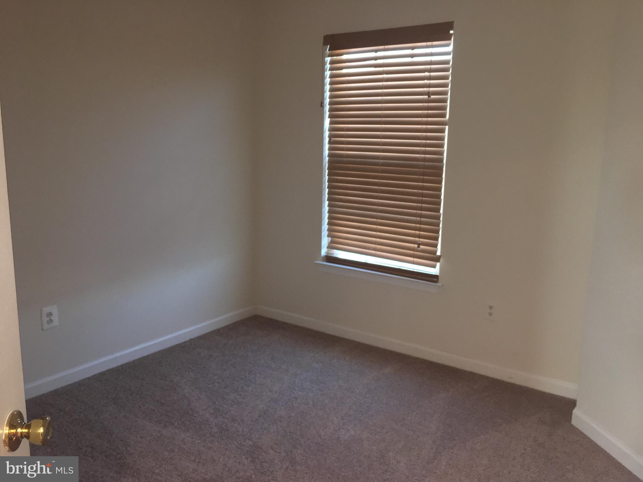 9609 Davison Road Baltimore, MD 21220 - Photo 12 of 21 an empty room with a window