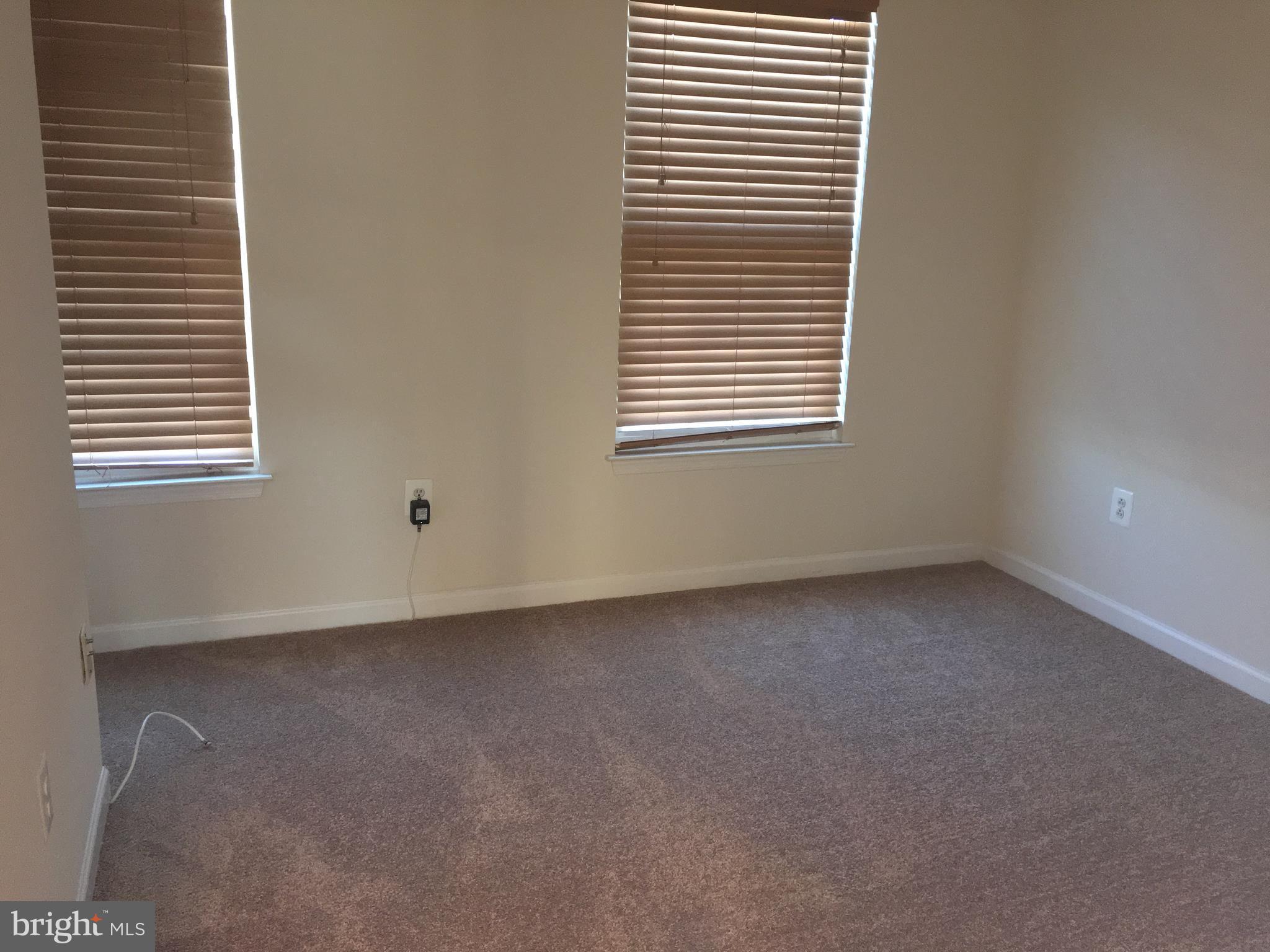9609 Davison Road Baltimore, MD 21220 - Photo 13 of 21 a view of a room that has a window in it