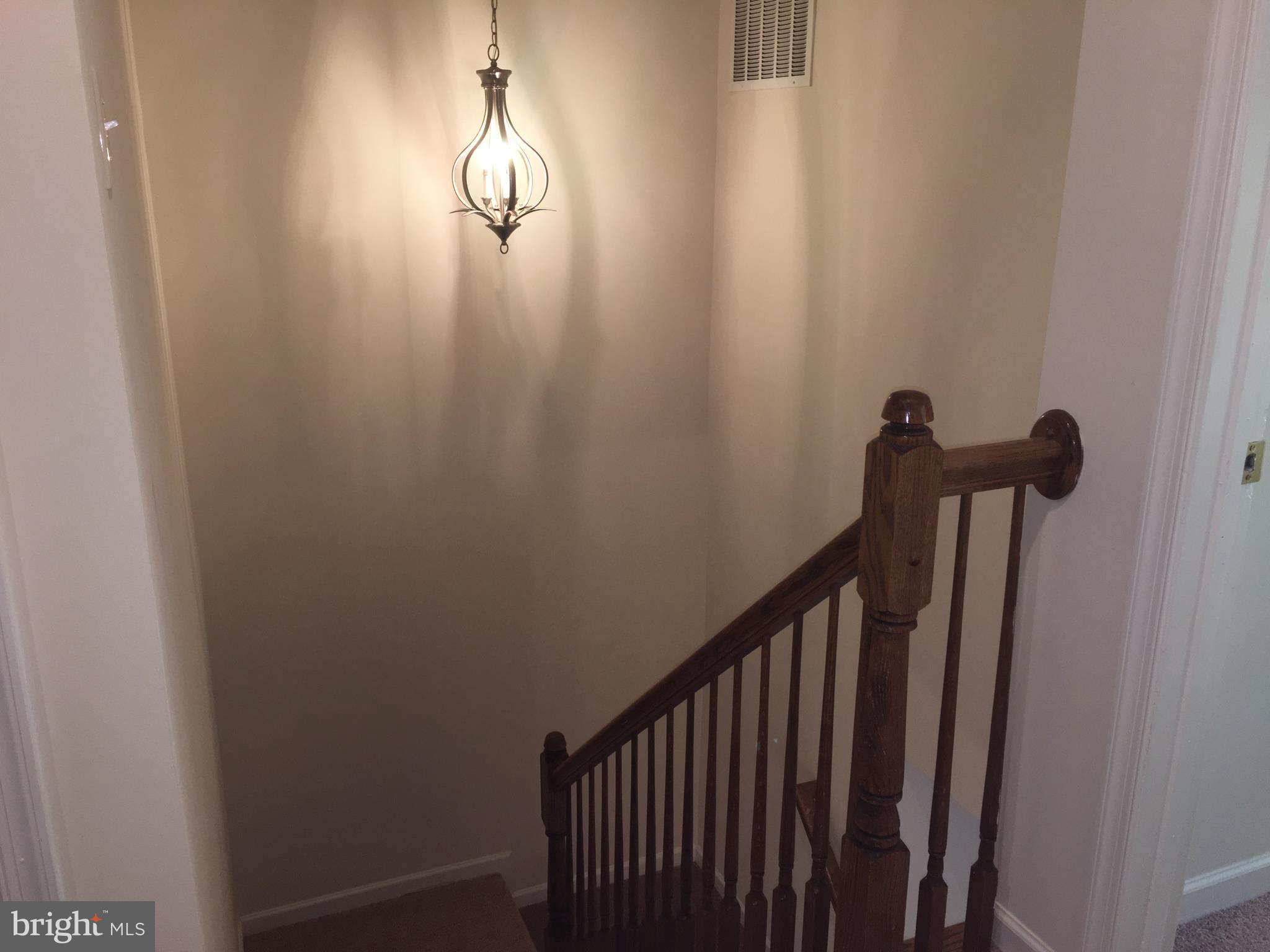 9609 Davison Road Baltimore, MD 21220 - Photo 14 of 21 a view of a hallway with windows
