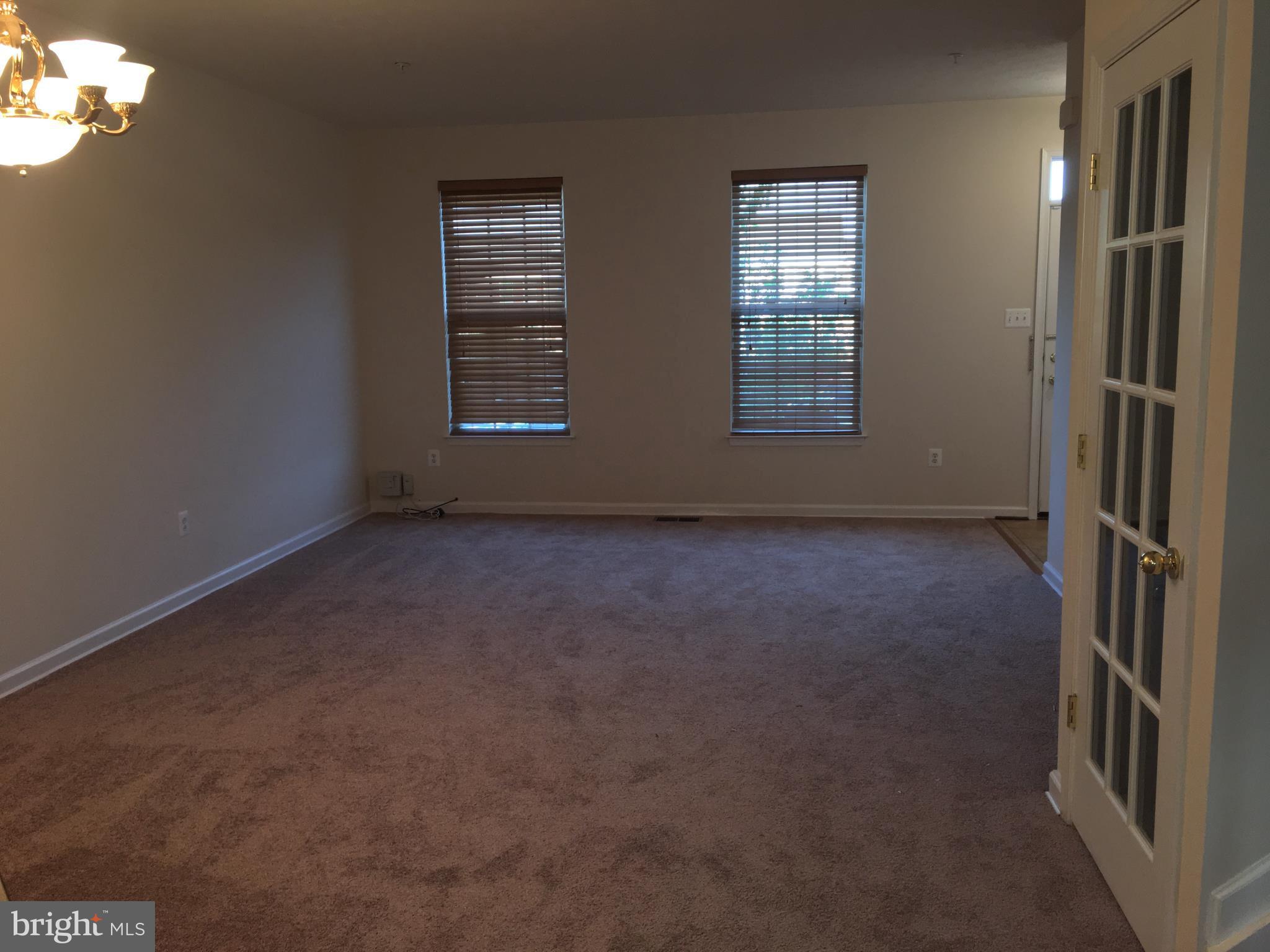 9609 Davison Road Baltimore, MD 21220 - Photo 16 of 21 a view of an empty room with a window