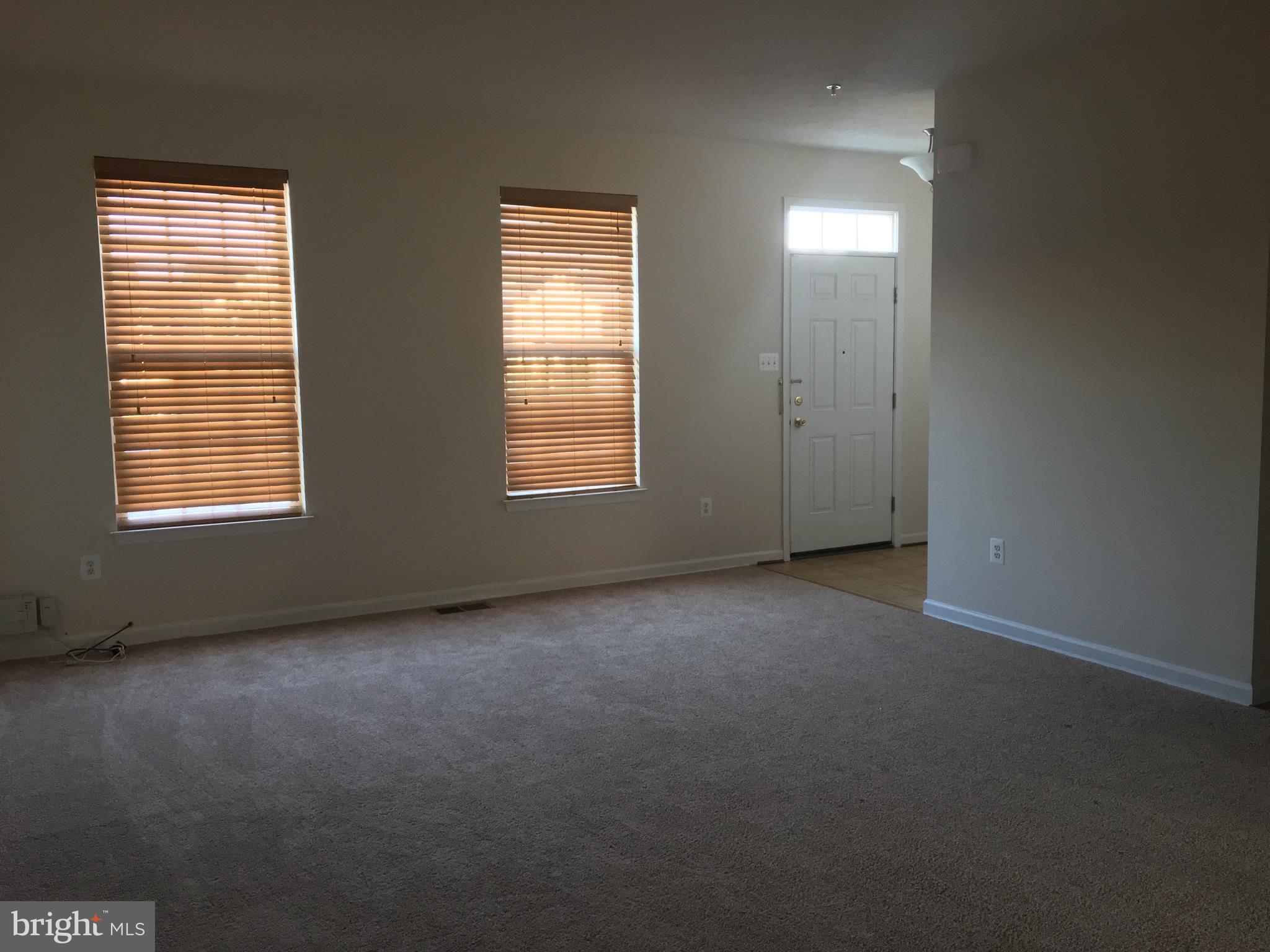 9609 Davison Road Baltimore, MD 21220 - Photo 20 of 21 an empty room with windows