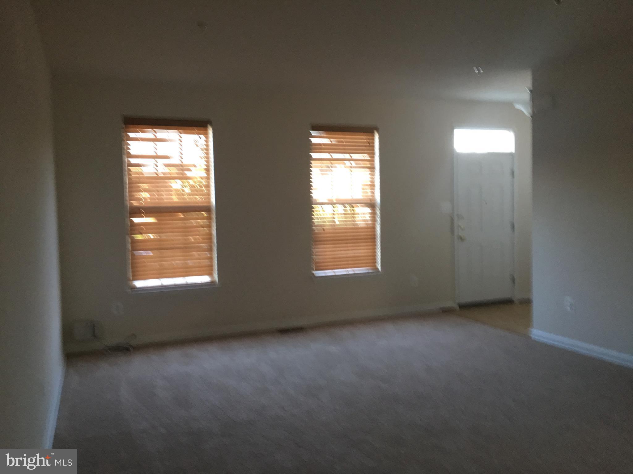9609 Davison Road Baltimore, MD 21220 - Photo 21 of 21 an empty room with windows