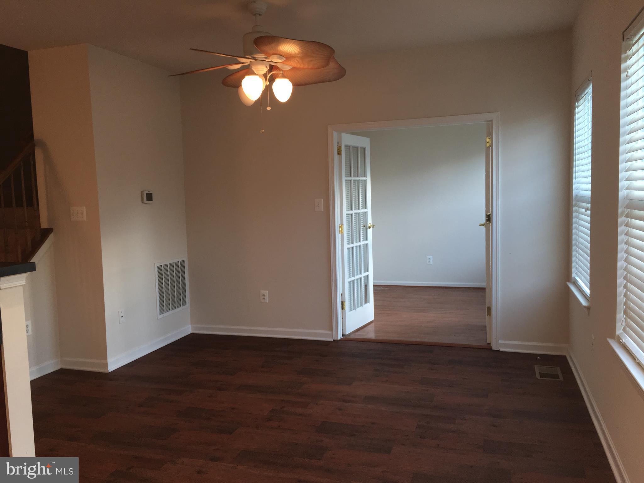 9609 Davison Road Baltimore, MD 21220 - Photo 6 of 21 a view of a livingroom with wooden floor