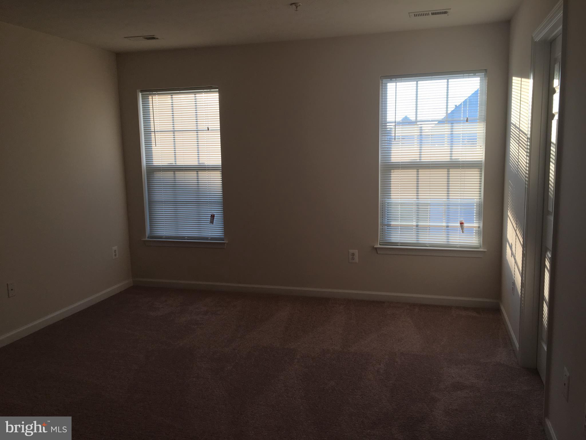 9609 Davison Road Baltimore, MD 21220 - Photo 8 of 21 an empty room with a window