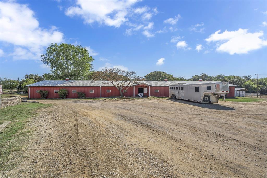 7950 Cross Timbers Road Flower Mound, TX 75022 - Photo 24 of 37 a front view of a house with a yard