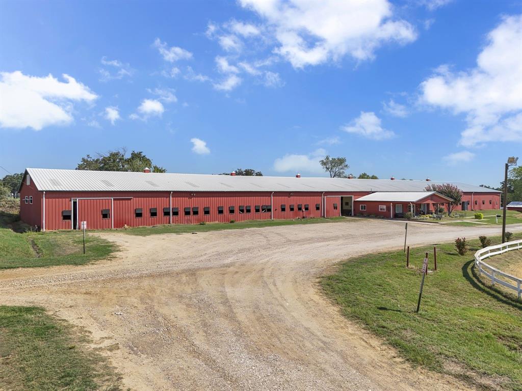 7950 Cross Timbers Road Flower Mound, TX 75022 - Photo 36 of 37 a view of a swimming pool with a yard