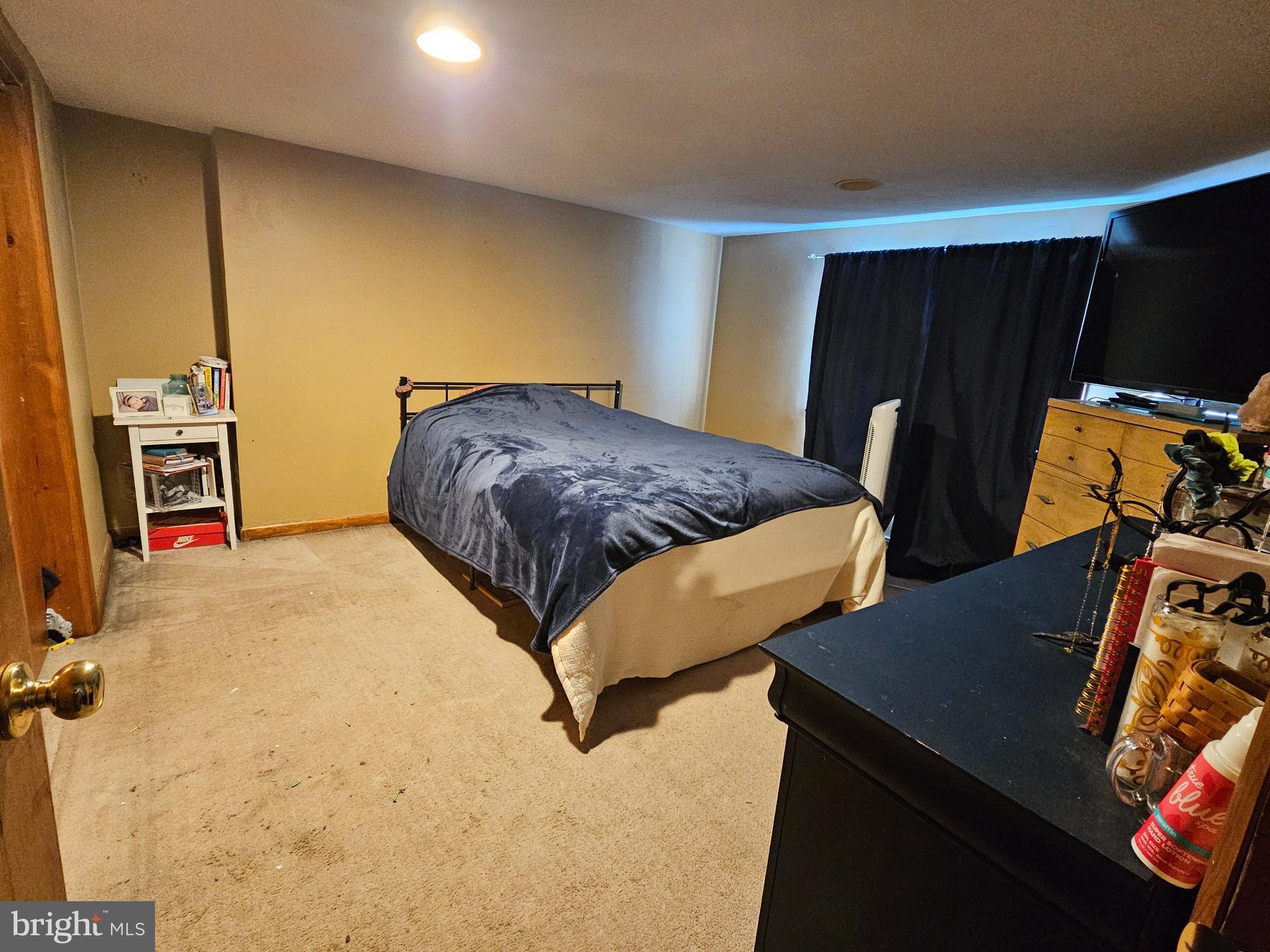 57 Union Street Pennsville, NJ 08070 - Photo 15 of 24 a bedroom with bed and wooden floor