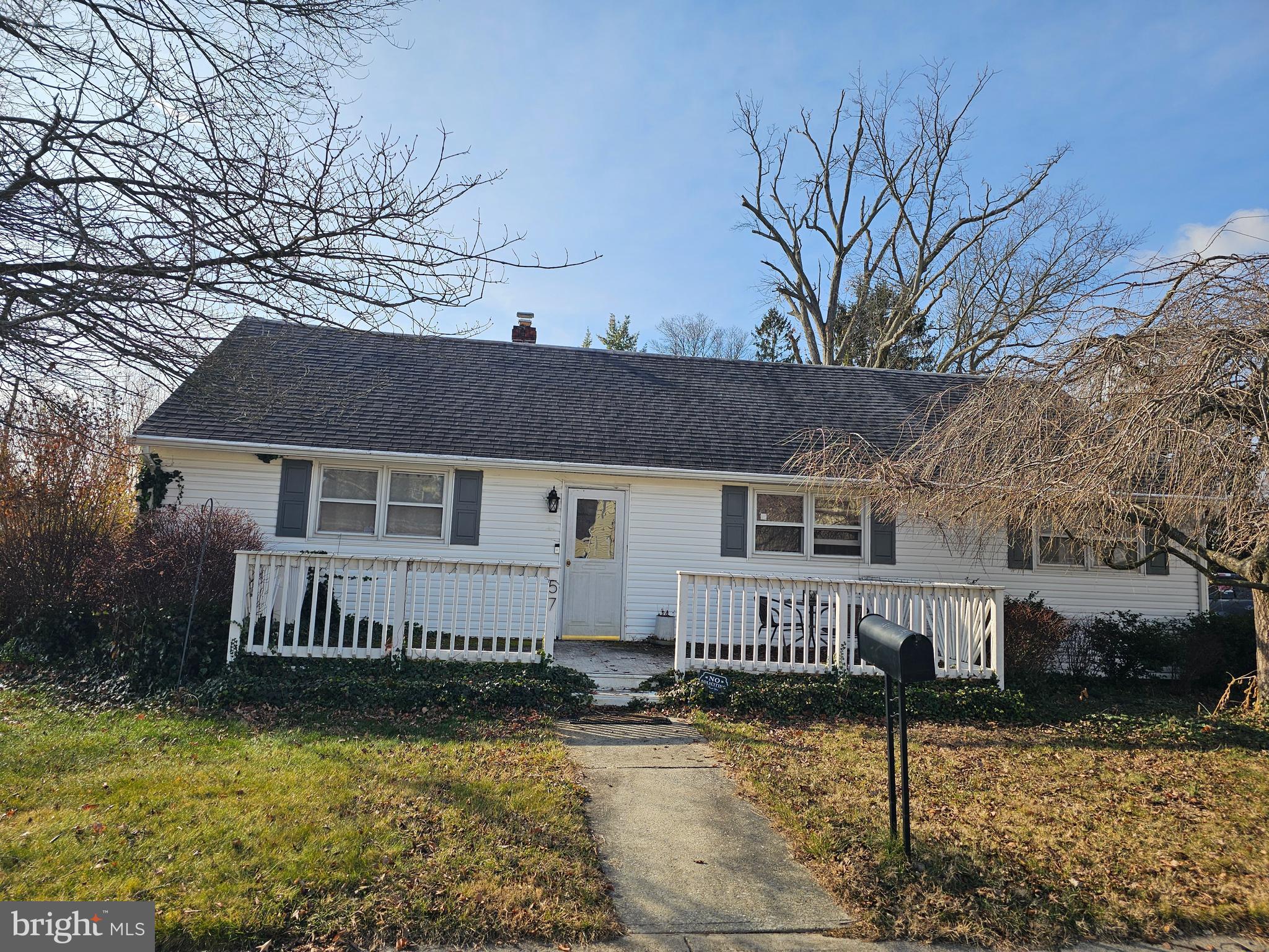 57 Union Street Pennsville, NJ 08070 - Photo 3 of 24 a front view of a house with garden yard and deck