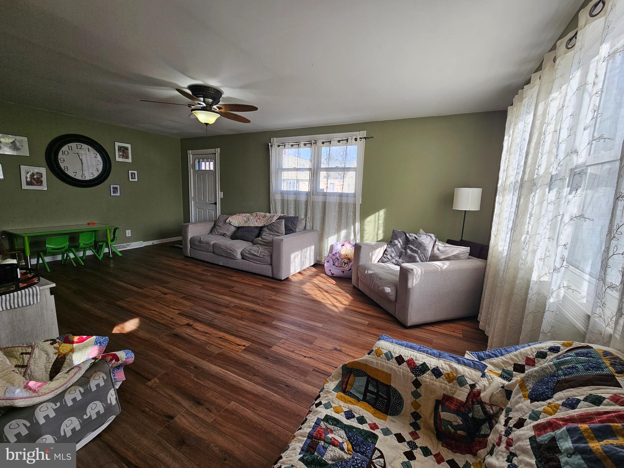 57 Union Street Pennsville, NJ 08070 - Photo 5 of 24 a living room with furniture and a window