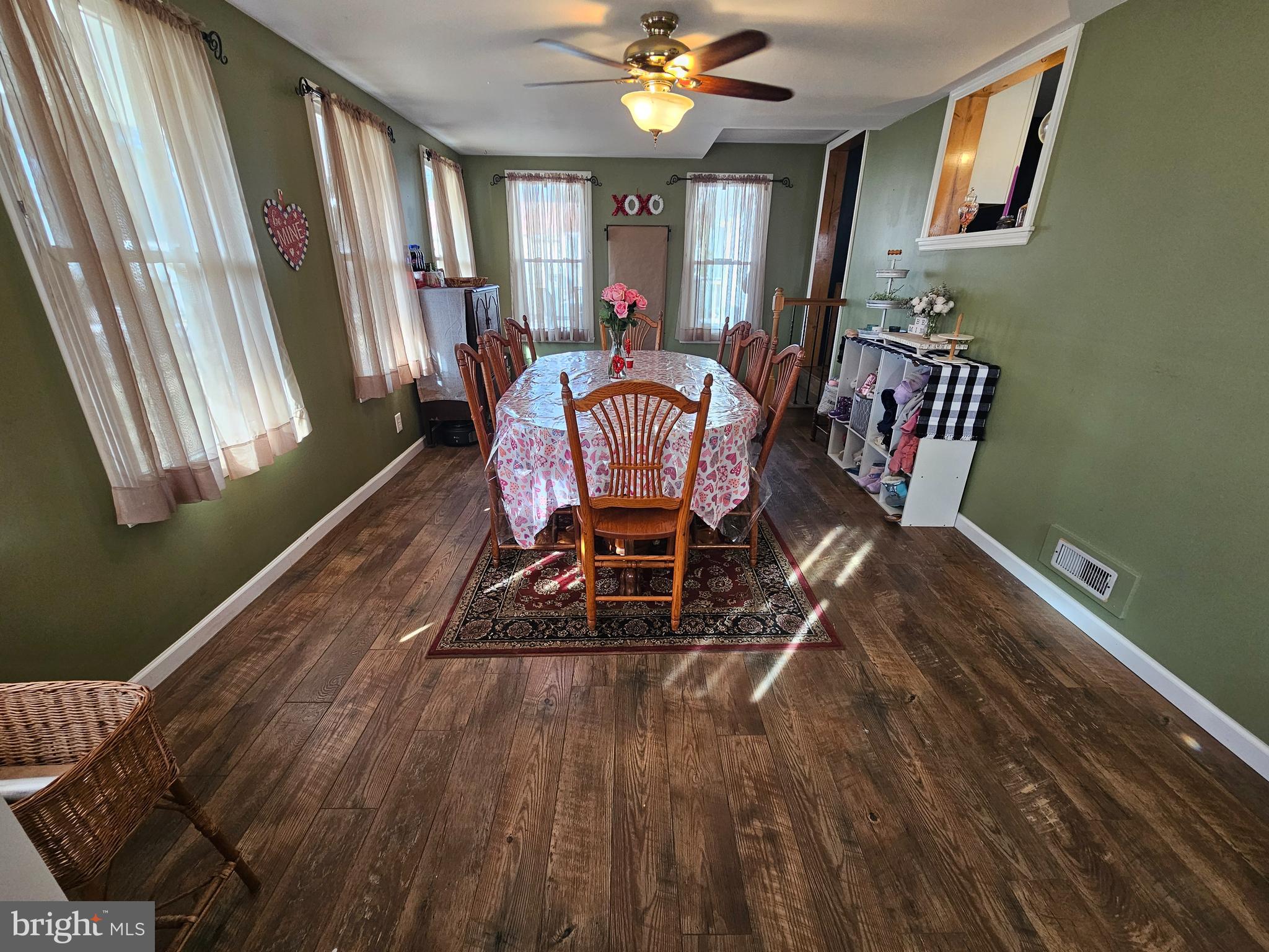 57 Union Street Pennsville, NJ 08070 - Photo 10 of 24 a dining room with furniture a chandelier and wooden floor