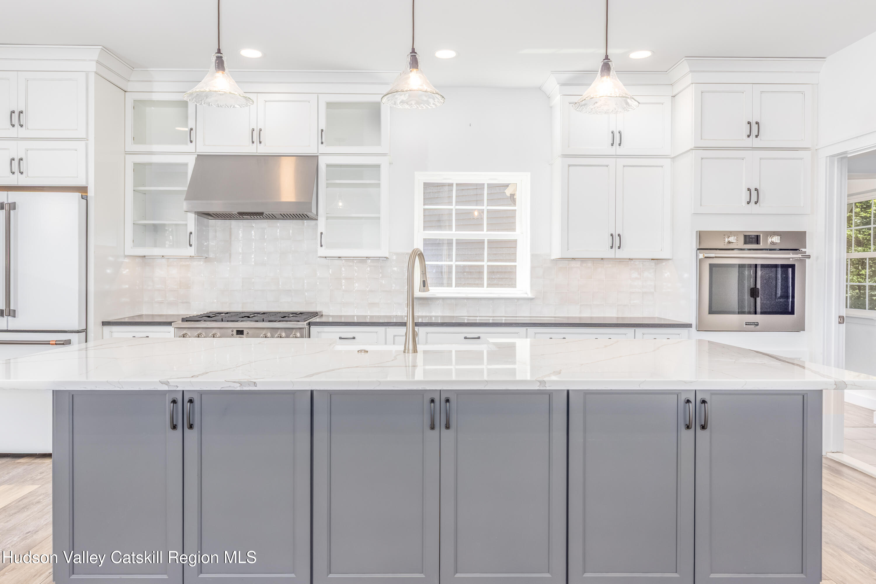 621 Decker Road Wallkill, NY 12589 - Photo 13 of 44 a kitchen with stainless steel appliances granite countertop a sink and a refrigerator
