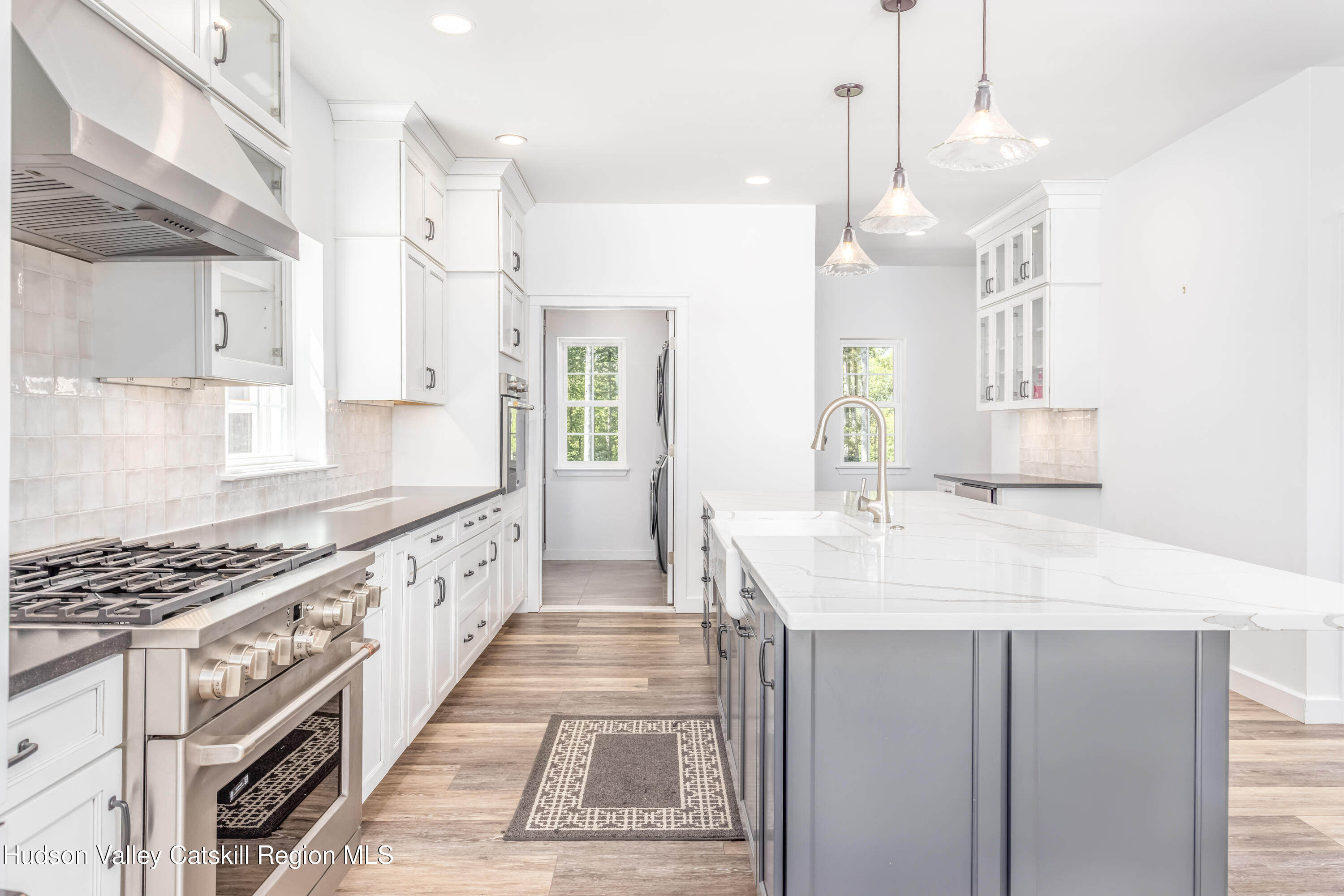 621 Decker Road Wallkill, NY 12589 - Photo 15 of 44 a kitchen with stainless steel appliances kitchen island granite countertop a sink and a stove