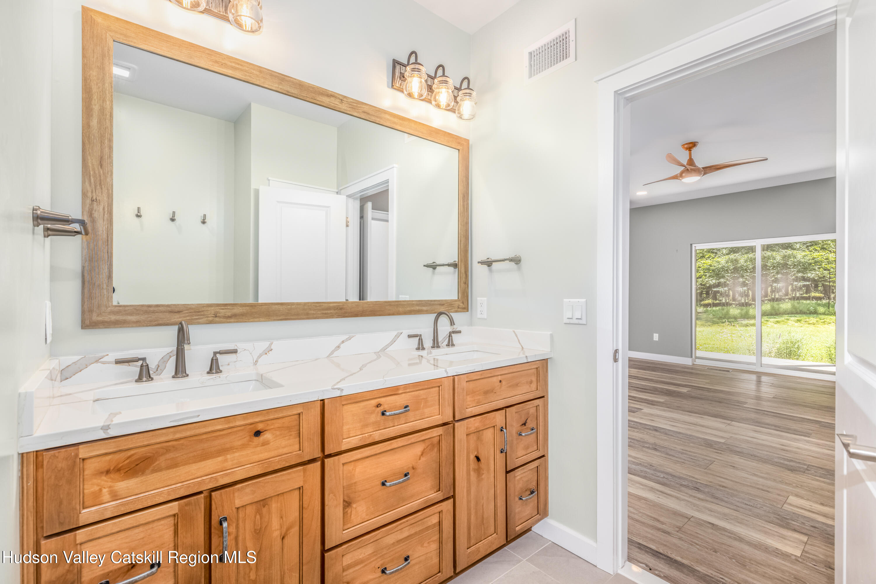 621 Decker Road Wallkill, NY 12589 - Photo 21 of 44 a bathroom with a sink and a mirror