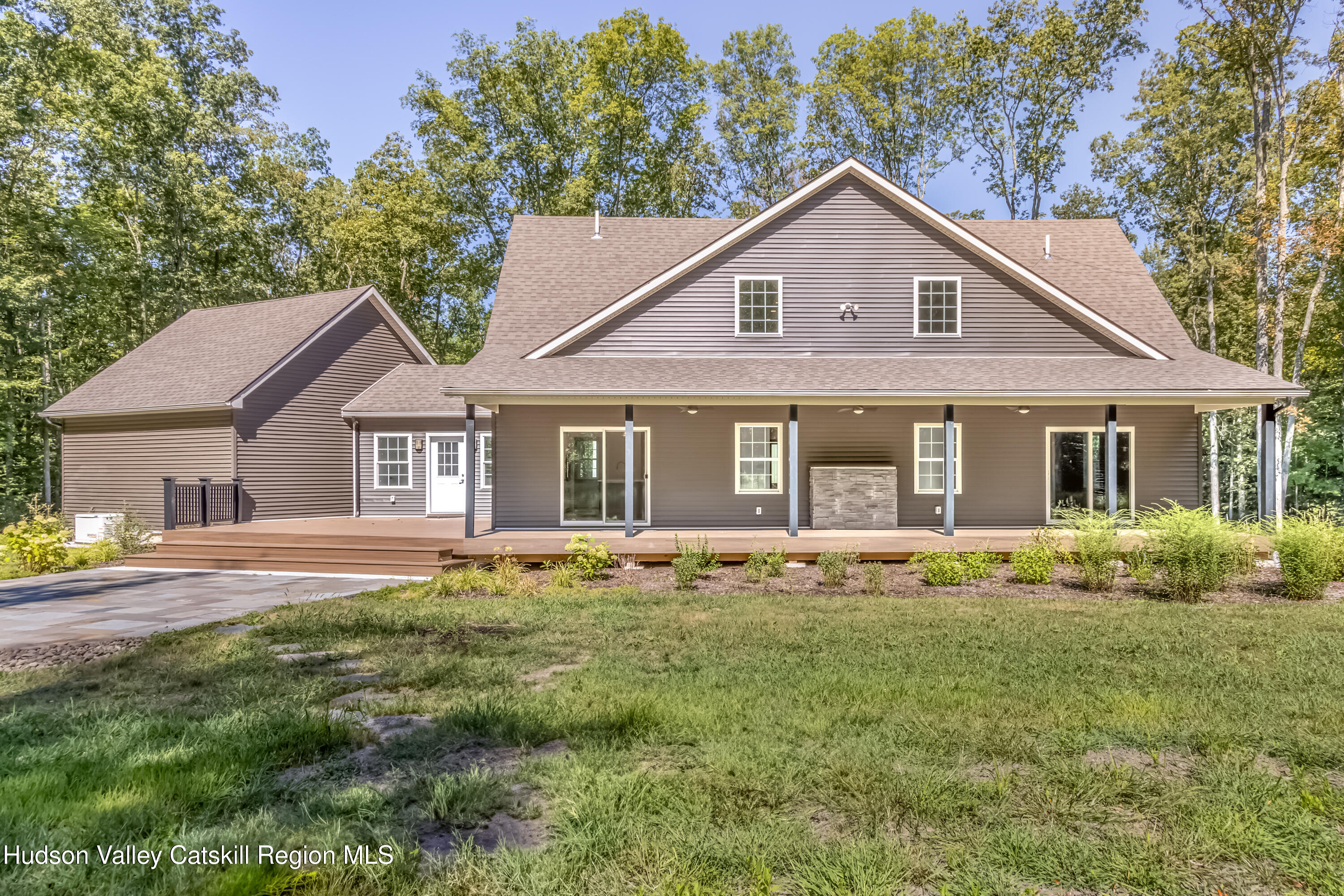 621 Decker Road Wallkill, NY 12589 - Photo 40 of 44 a front view of a house with a garden