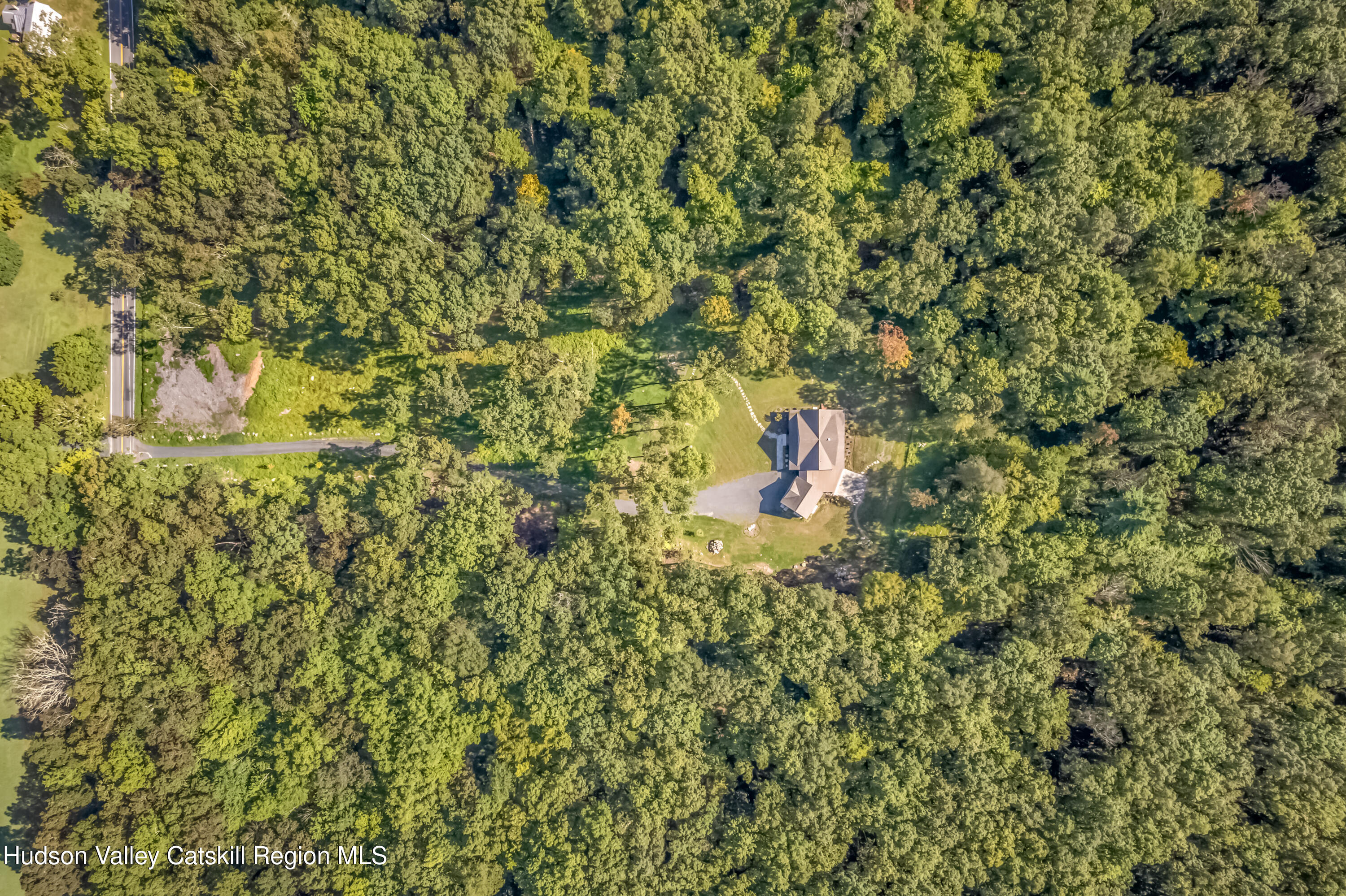 621 Decker Road Wallkill, NY 12589 - Photo 44 of 44 a backyard of a house with a seating space