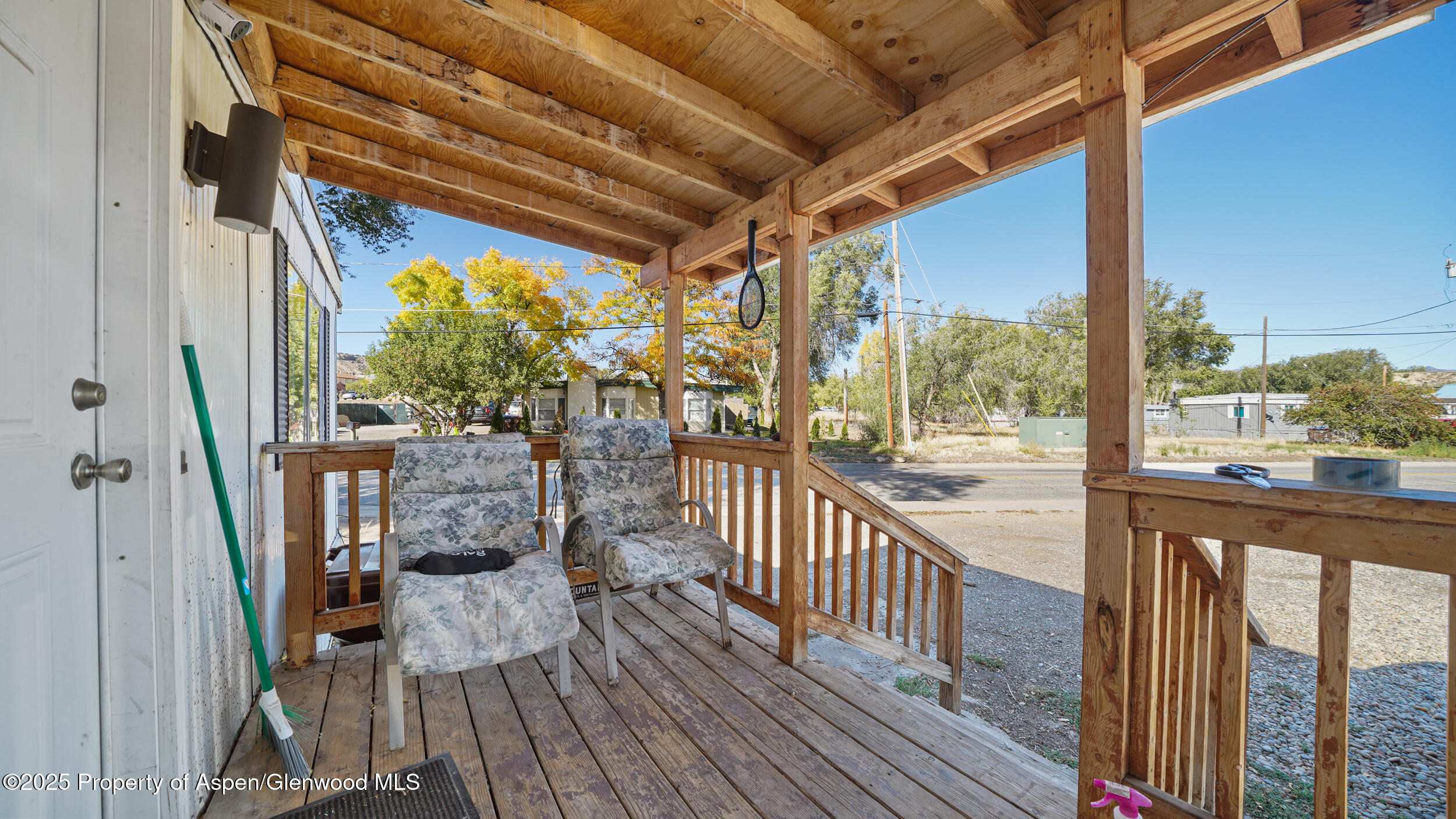 1501 Railroad Avenue, Unit 37 Rifle, CO 81650 - Photo 12 of 18 a view of balcony with wooden floor