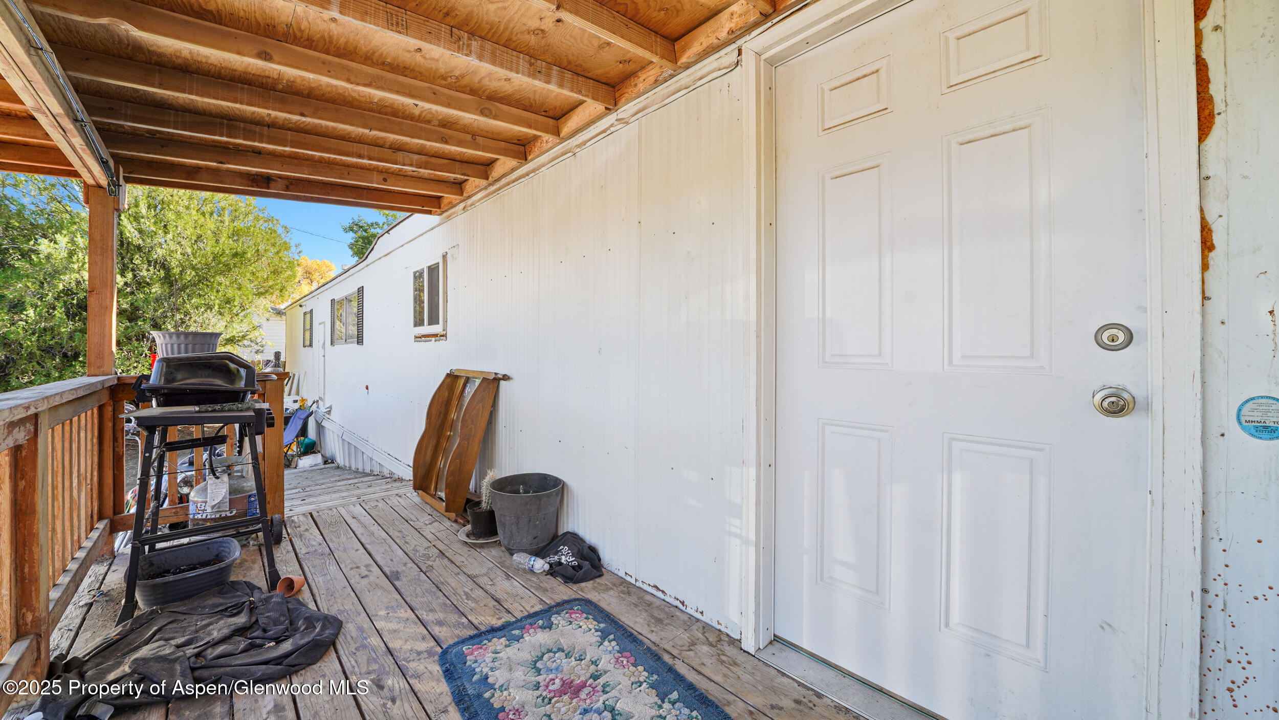 1501 Railroad Avenue, Unit 37 Rifle, CO 81650 - Photo 13 of 18 a view of workspace with wooden floor windows