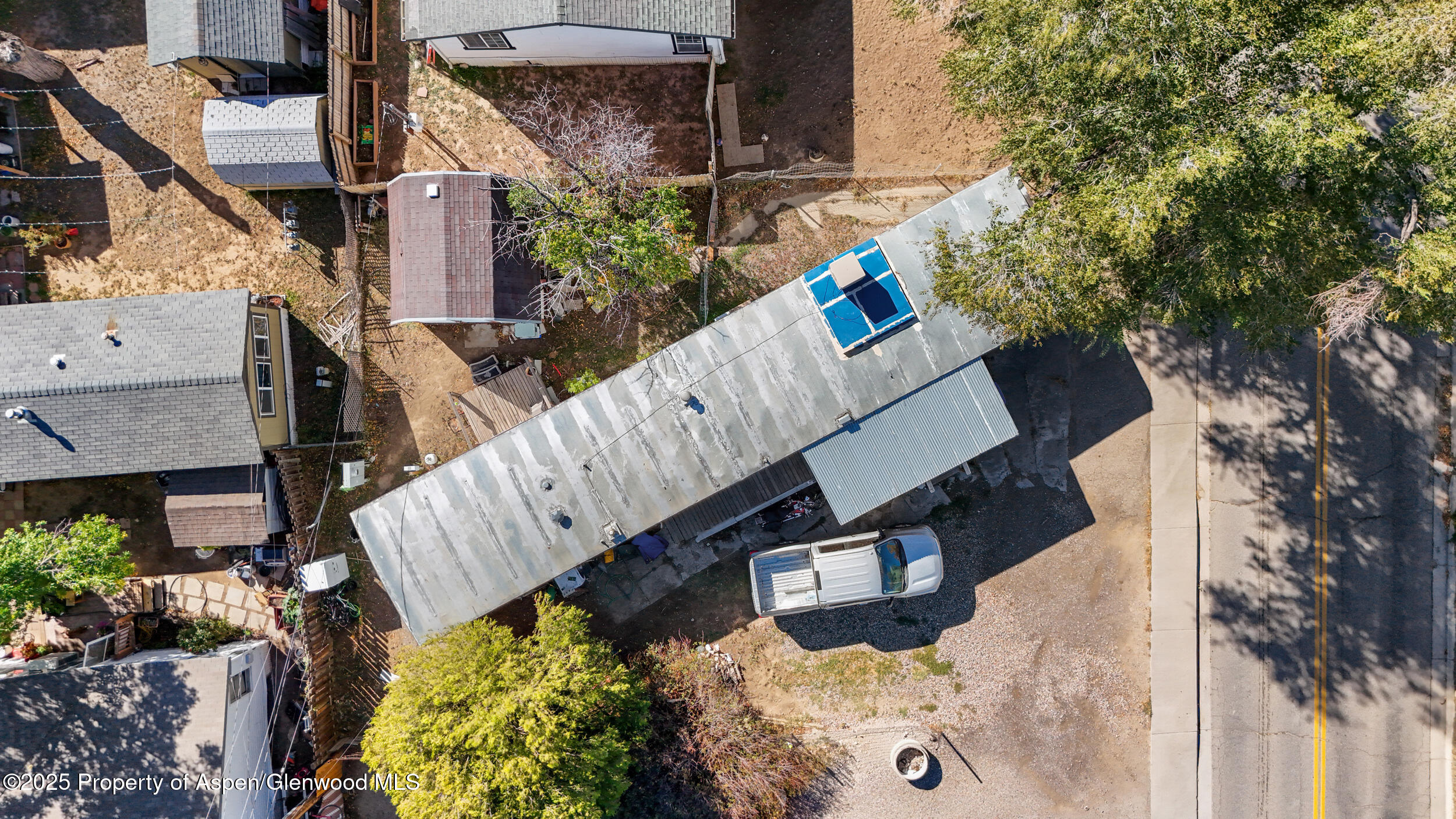 1501 Railroad Avenue, Unit 37 Rifle, CO 81650 - Photo 16 of 18 a view of an house with wooden fence and floor