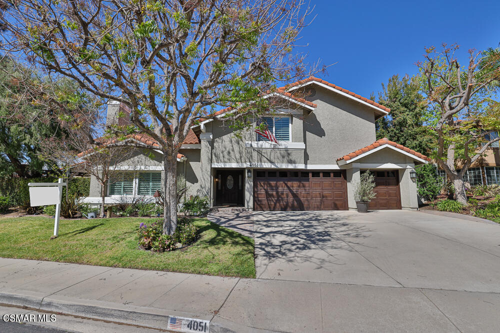4051 Doneva Road Moorpark, CA 93021 - Photo 2 of 52 a front view of a house with a yard
